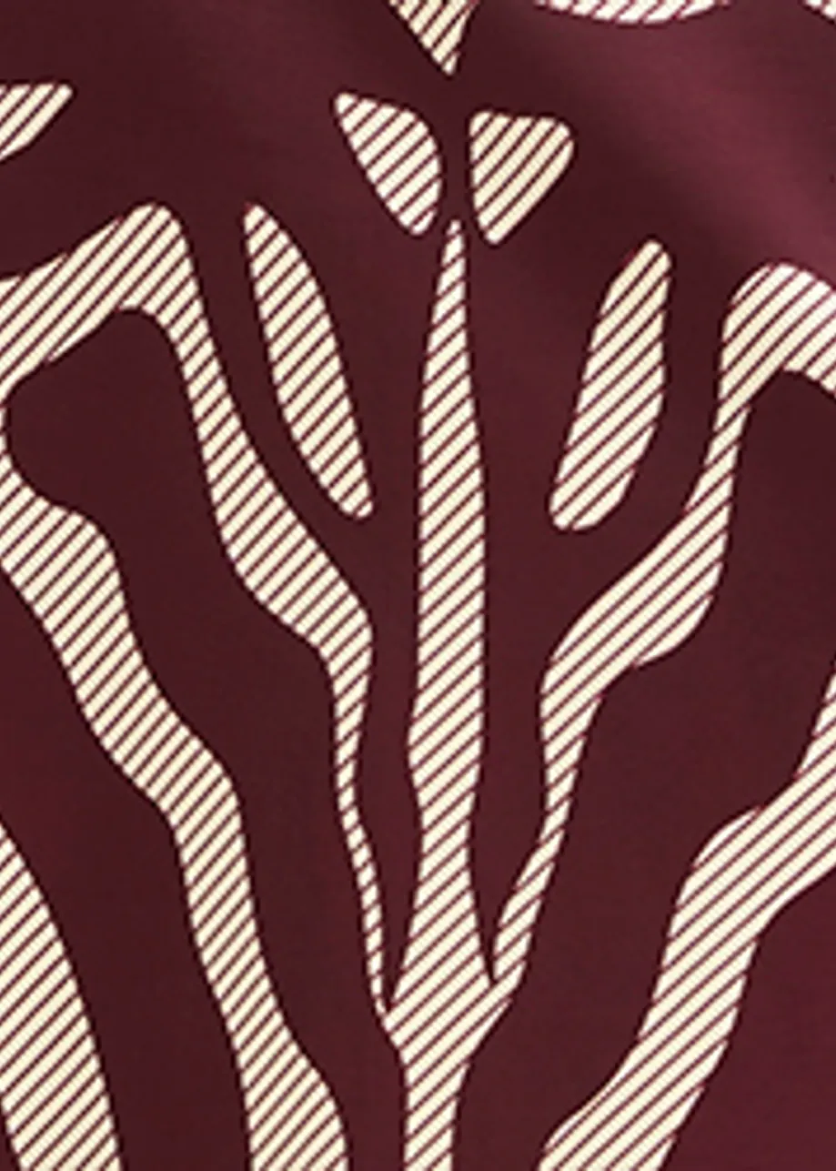 Bordeaux en gebroken witte maxi-jurk met zebraprint