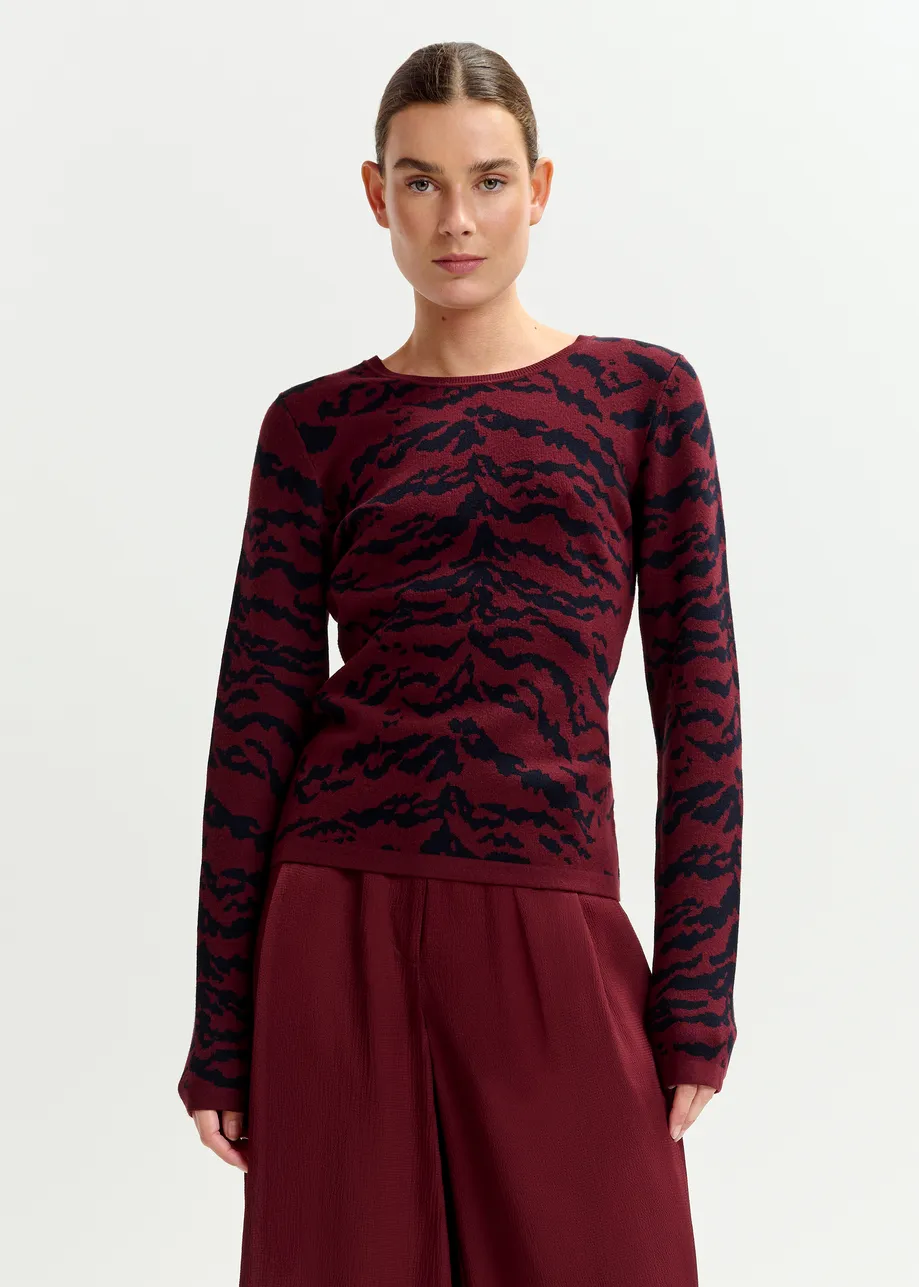 Burgundy and black zebra-print knitted sweater