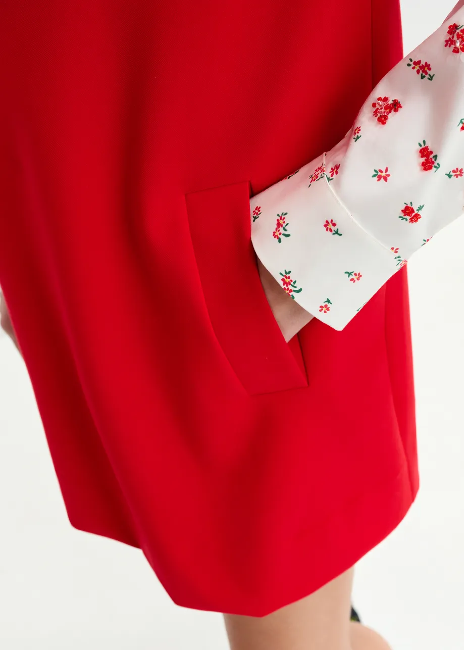 Red sleeveless v-neck mini dress