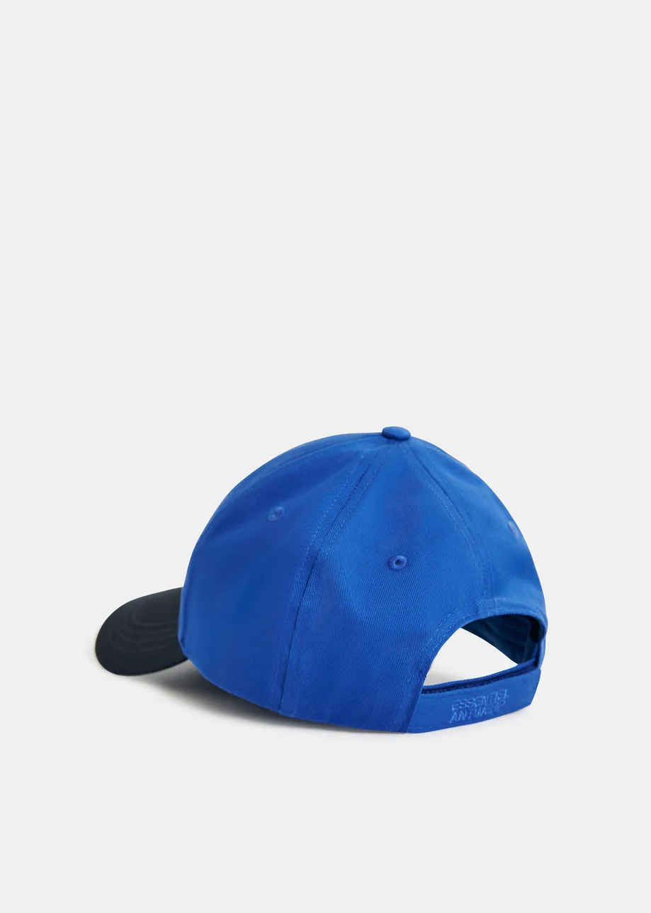 Navy, blue and white two-tone embroidered baseball cap with rhinestone patch