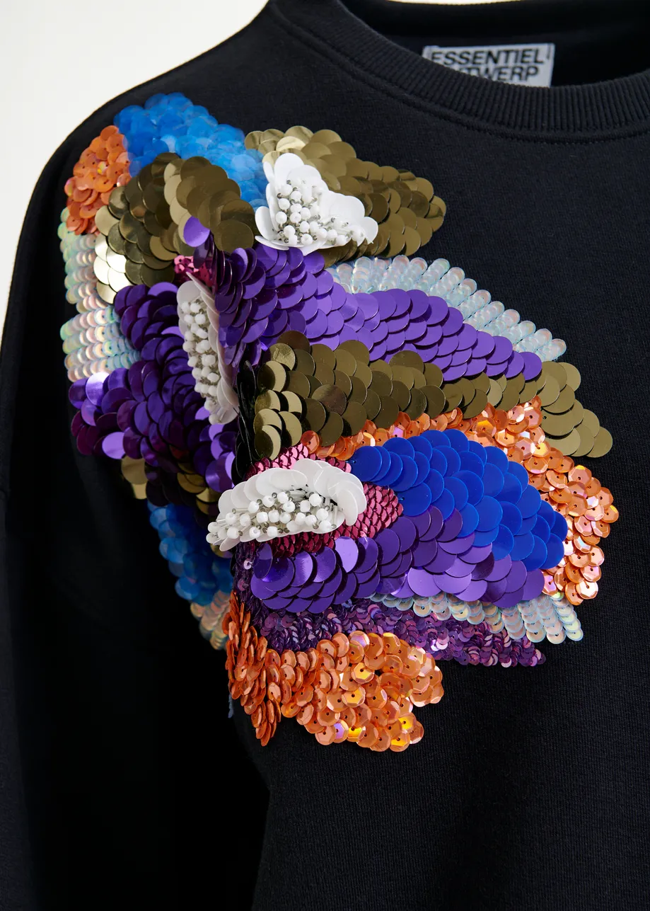 Zwarte sweater met veelkleurig borduurwerk