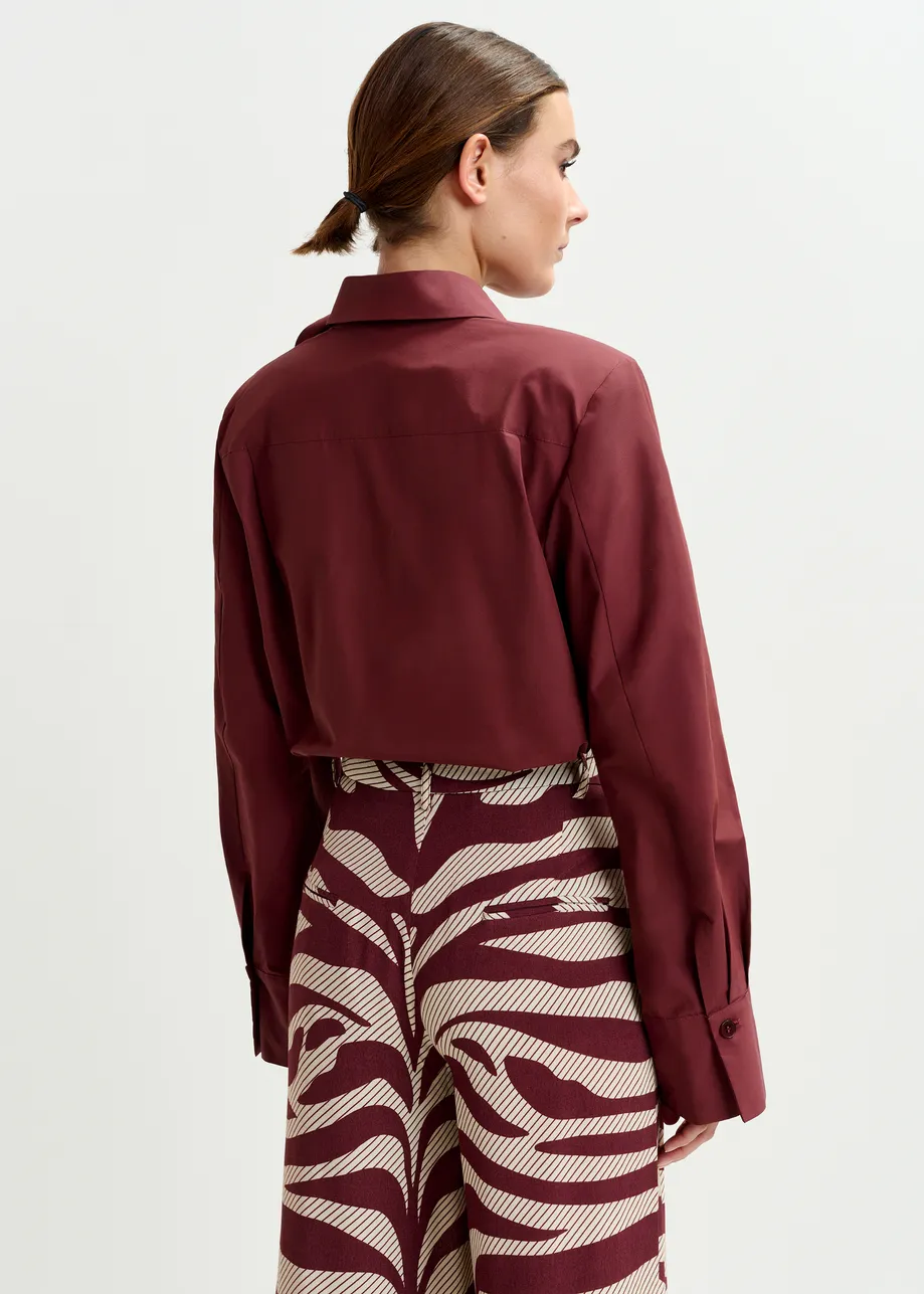 Burgundy bodysuit with self-fabric flower