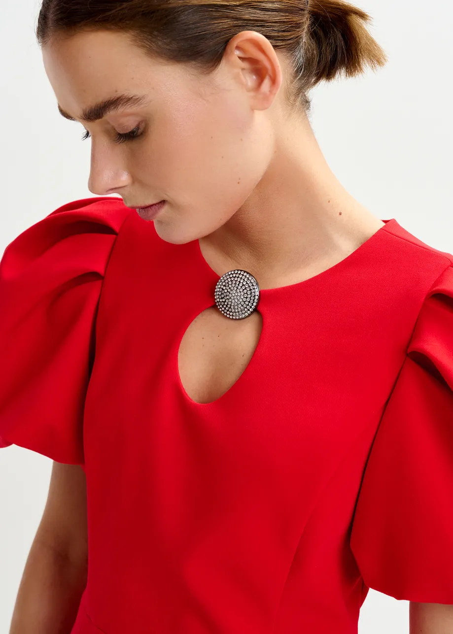 Red mini dress with voluminous sleeves and jewel embellishment
