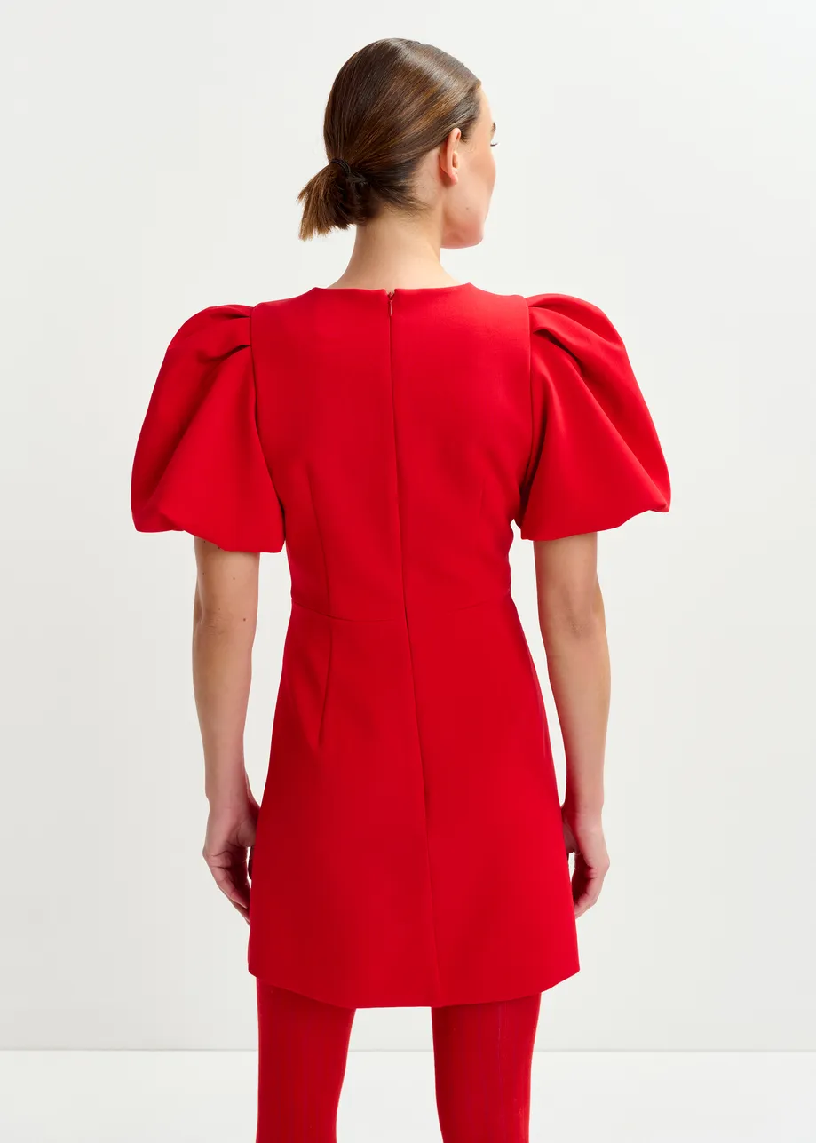 Red mini dress with voluminous sleeves and jewel embellishment
