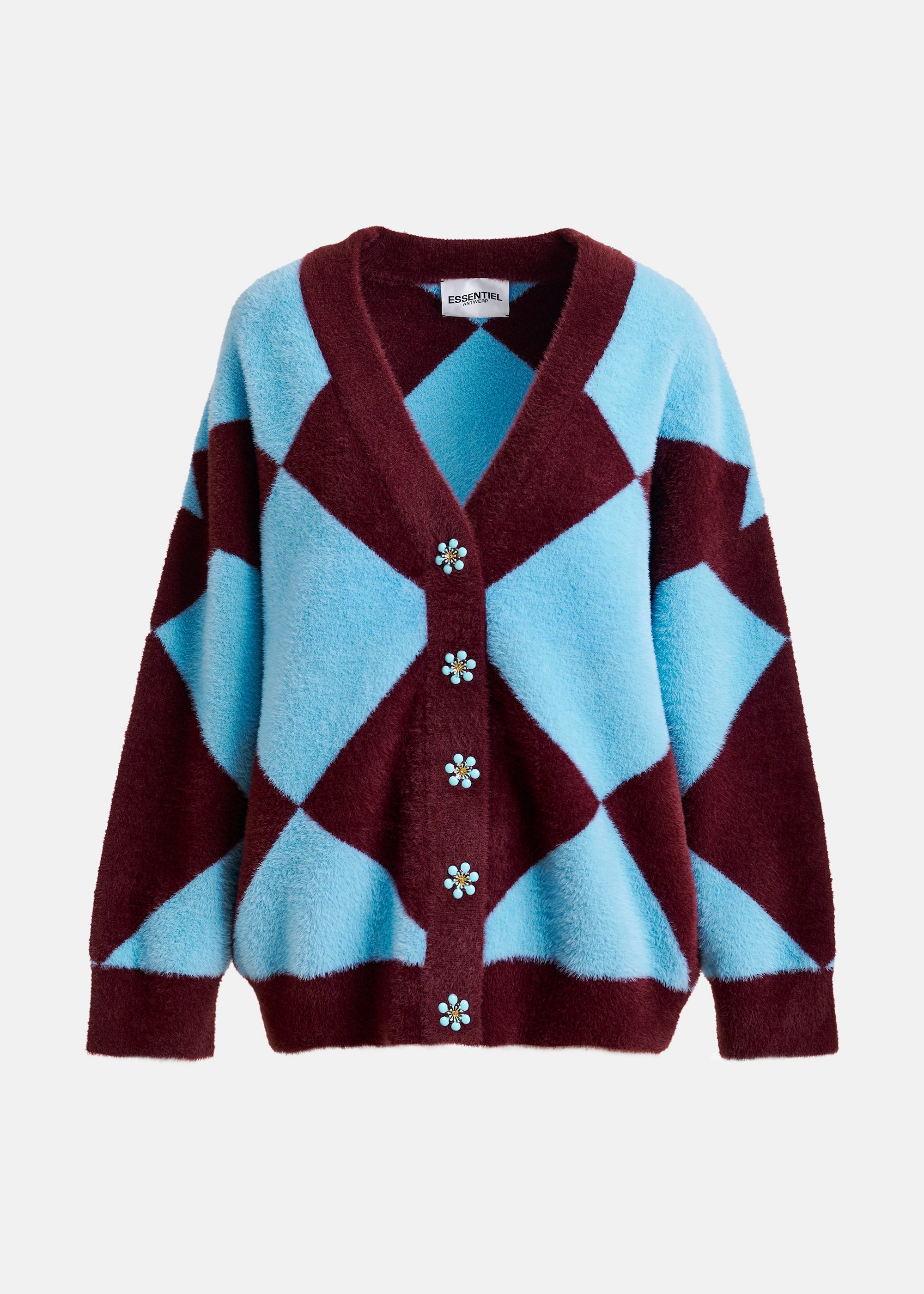 Blue and burgundy harlequin-patterned knit cardigan with flower