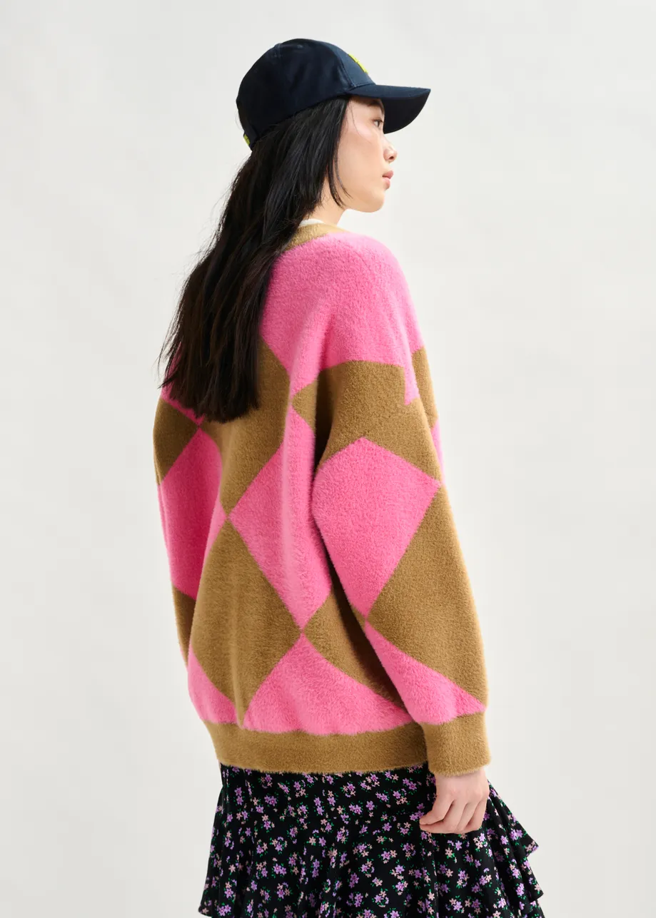 Brown and pink harlequin-patterned knit cardigan with flower-shaped buttons