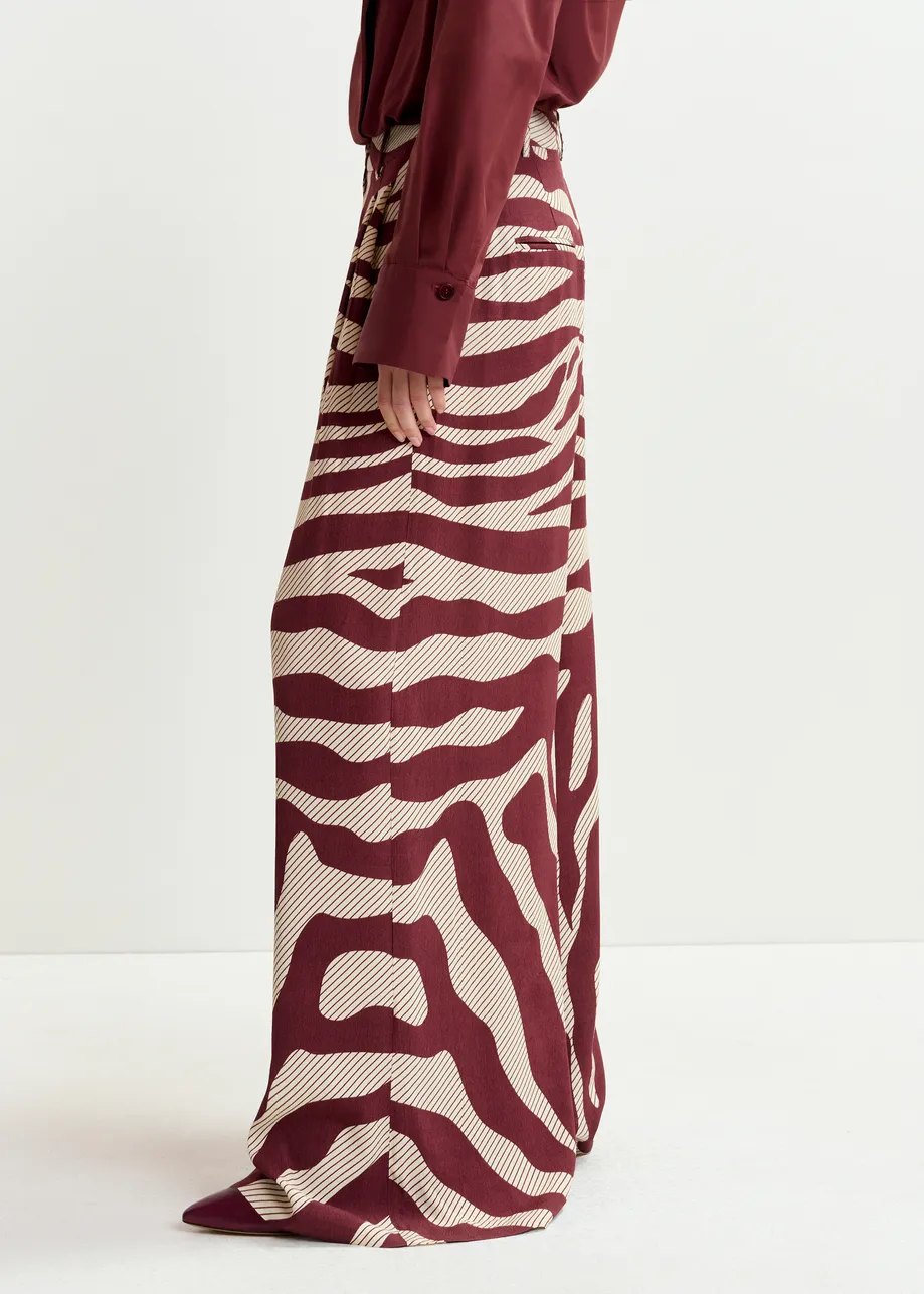 Pantalon large à imprimé zèbre blanc cassé et bordeaux
