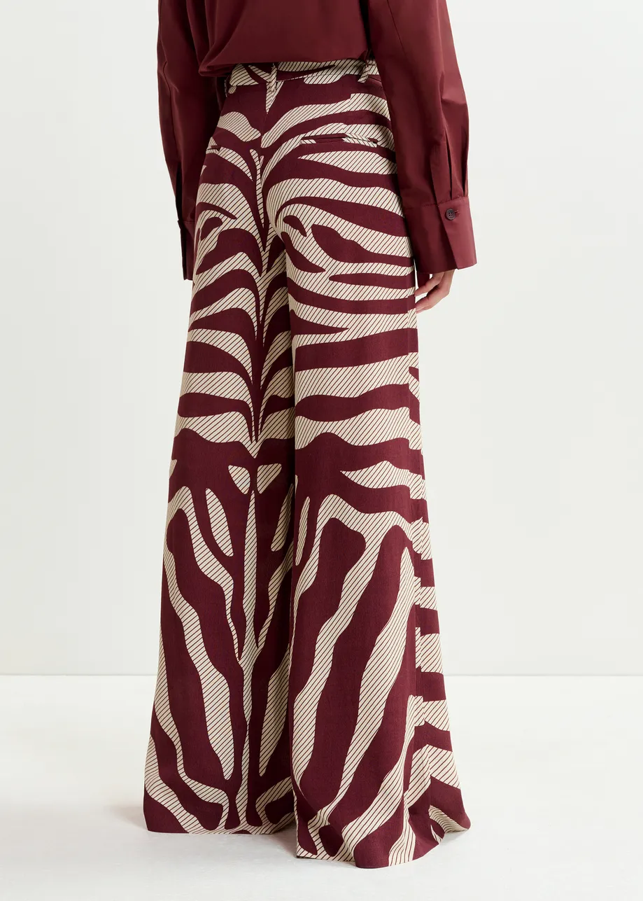 Pantalon large à imprimé zèbre blanc cassé et bordeaux