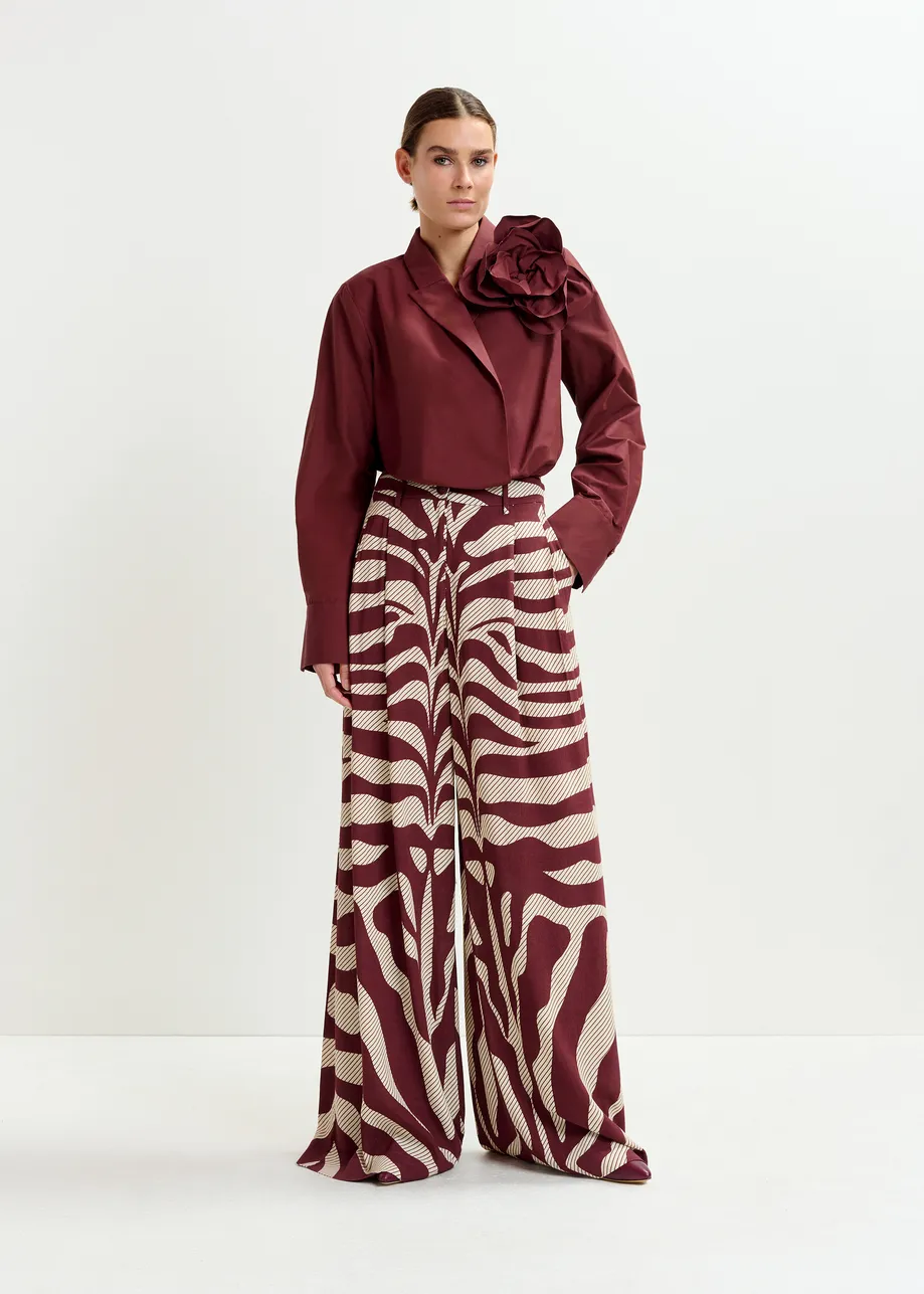 Pantalon large à imprimé zèbre blanc cassé et bordeaux