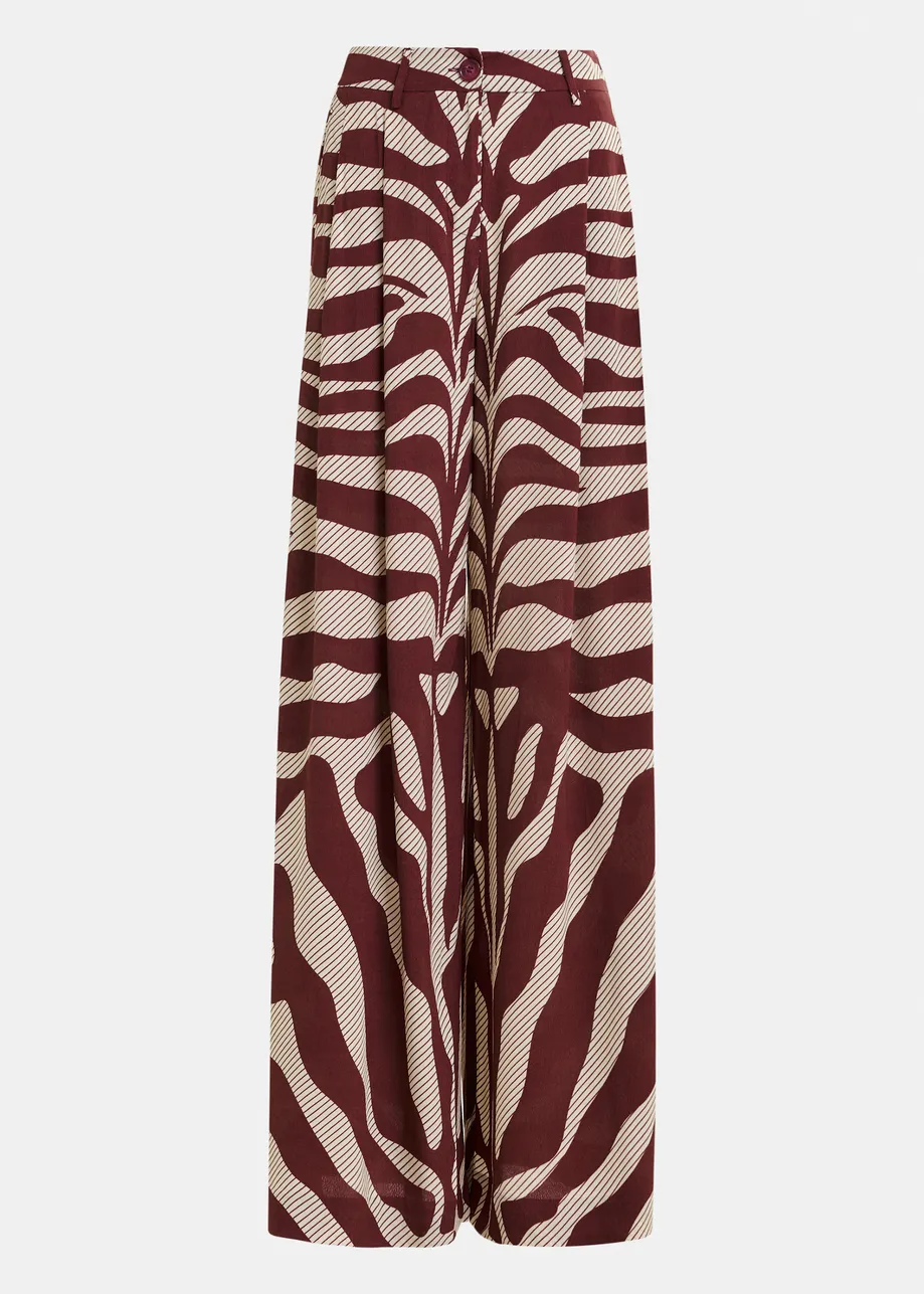 Off-white and burgundy zebra-print wide-leg pants