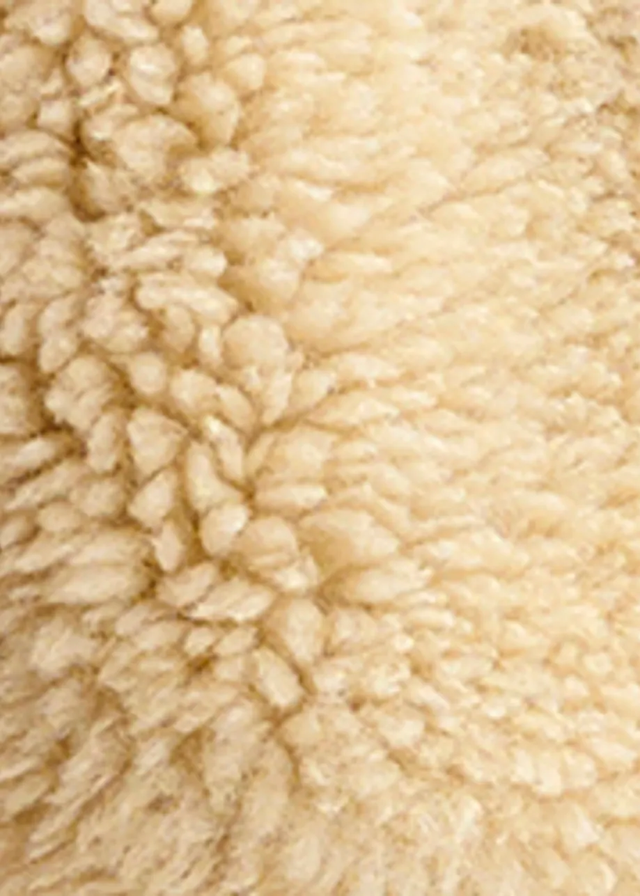 Beige oversized bomberjack in faux shearling