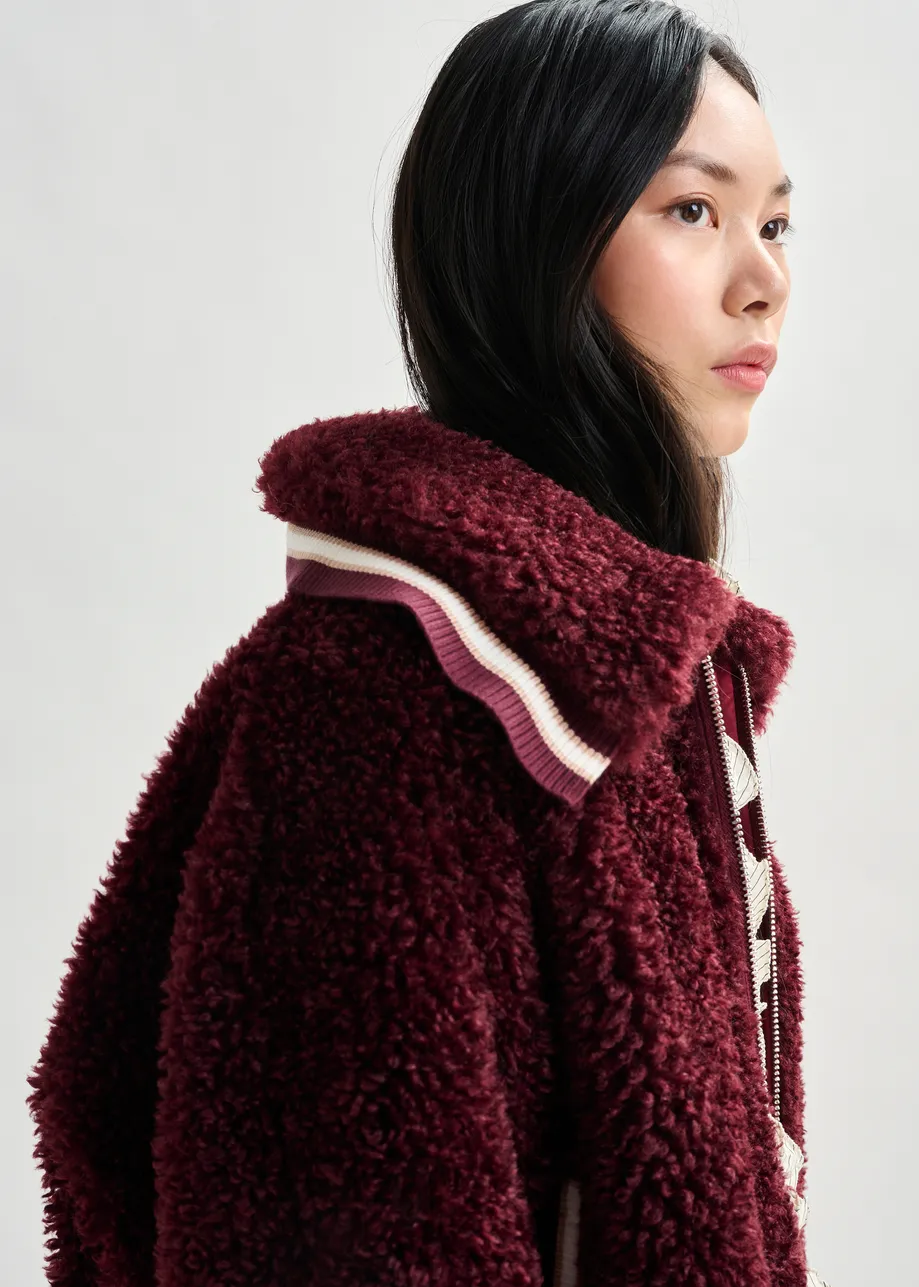 Burgundy and white oversized faux shearling bomber jacket