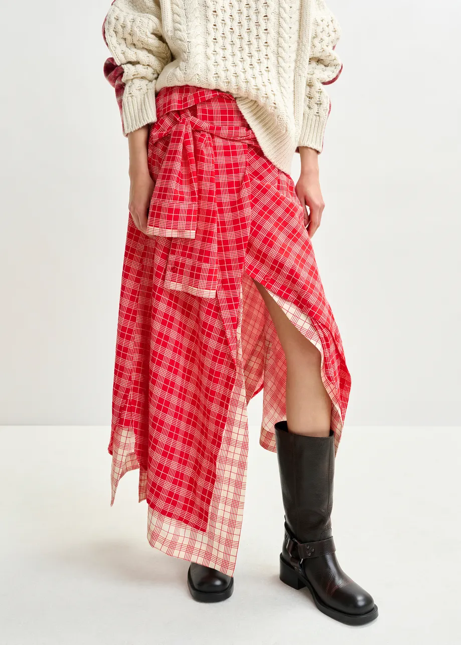 Red and off-white asymmetrical draped skirt with shirt-sleeve waist detail