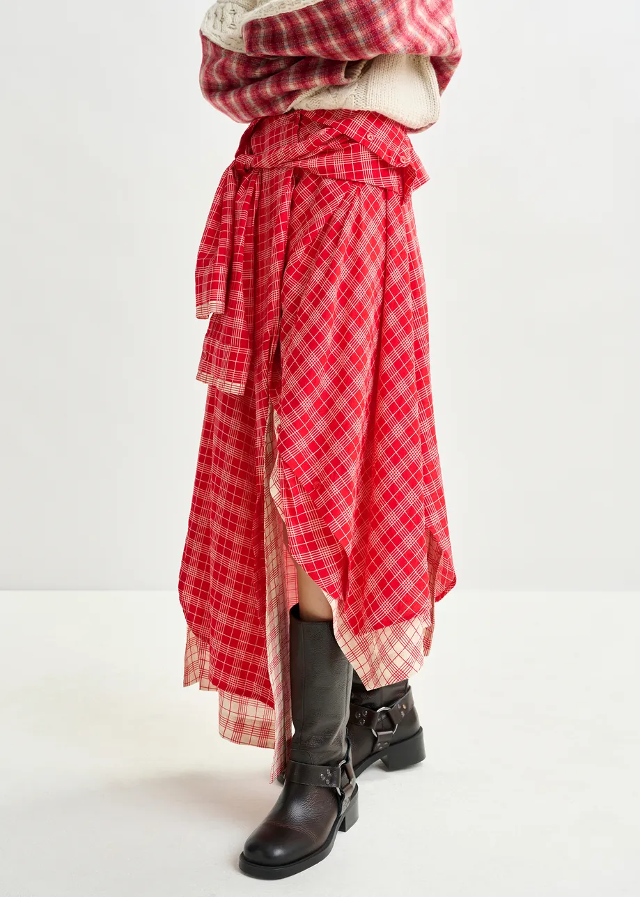 Red and off-white asymmetrical draped skirt with shirt-sleeve waist detail