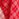 Red and off-white asymmetrical draped skirt with shirt-sleeve waist detail