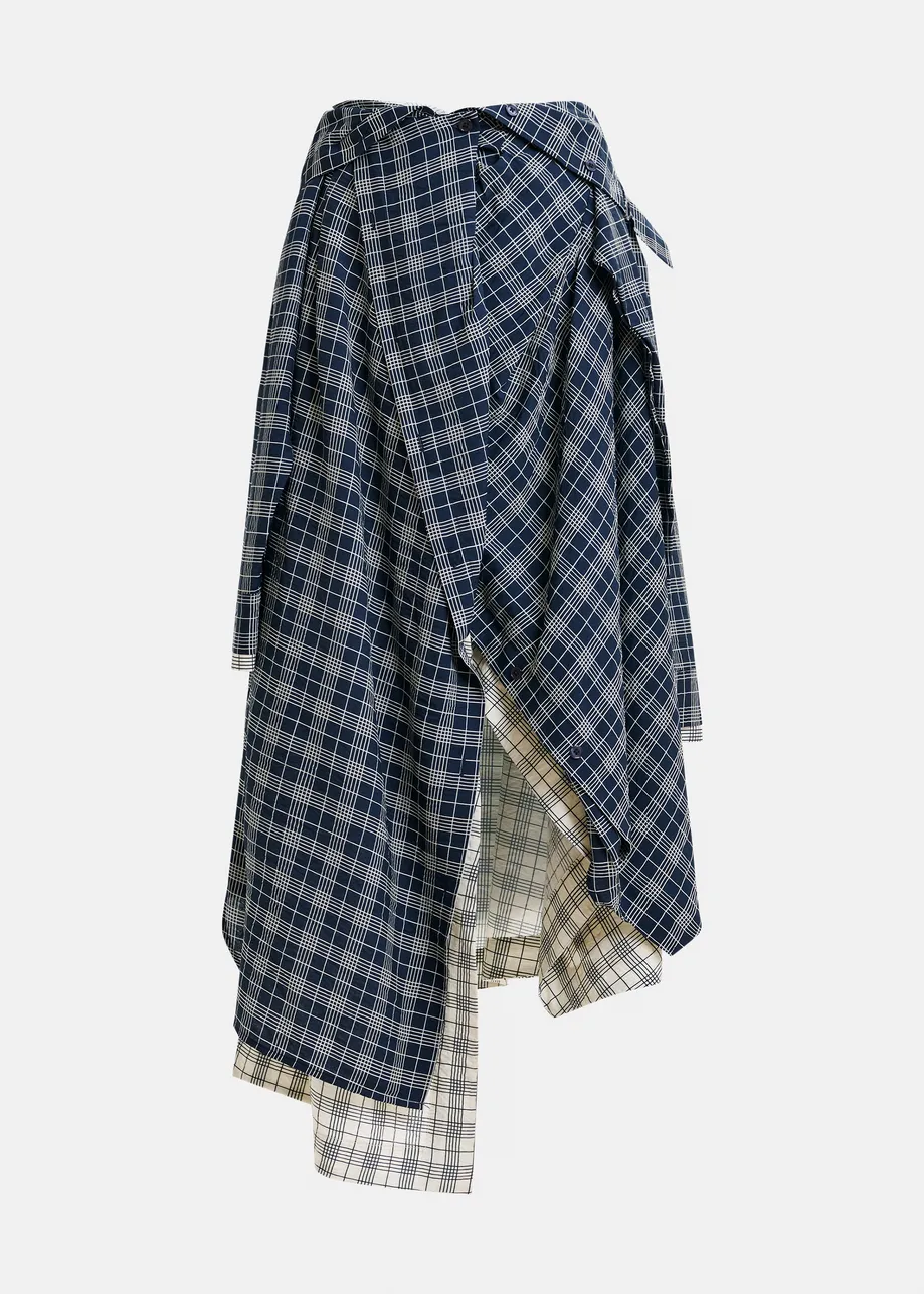Navy and white asymmetrical draped skirt with shirt-sleeve waist detail