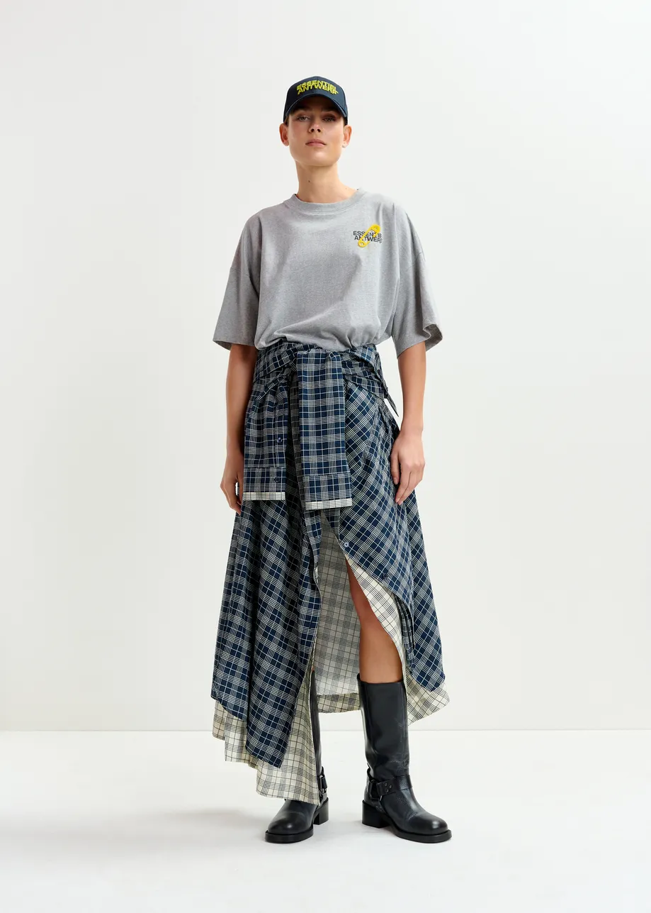Navy and white asymmetrical draped skirt with shirt-sleeve waist detail