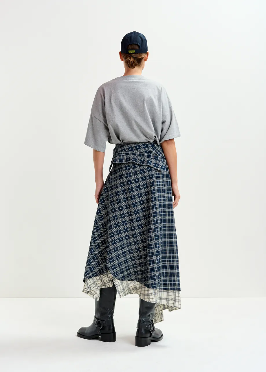Navy and white asymmetrical draped skirt with shirt-sleeve waist detail
