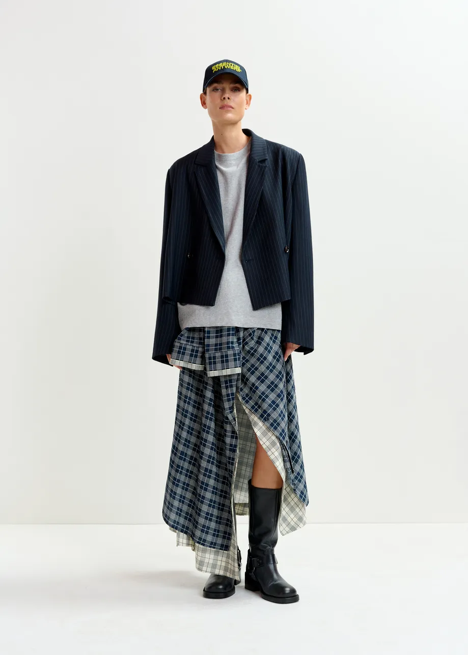 Navy and white asymmetrical draped skirt with shirt-sleeve waist detail