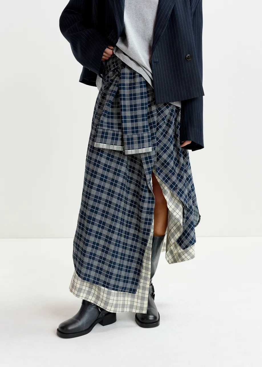 Navy and white asymmetrical draped skirt with shirt-sleeve waist detail
