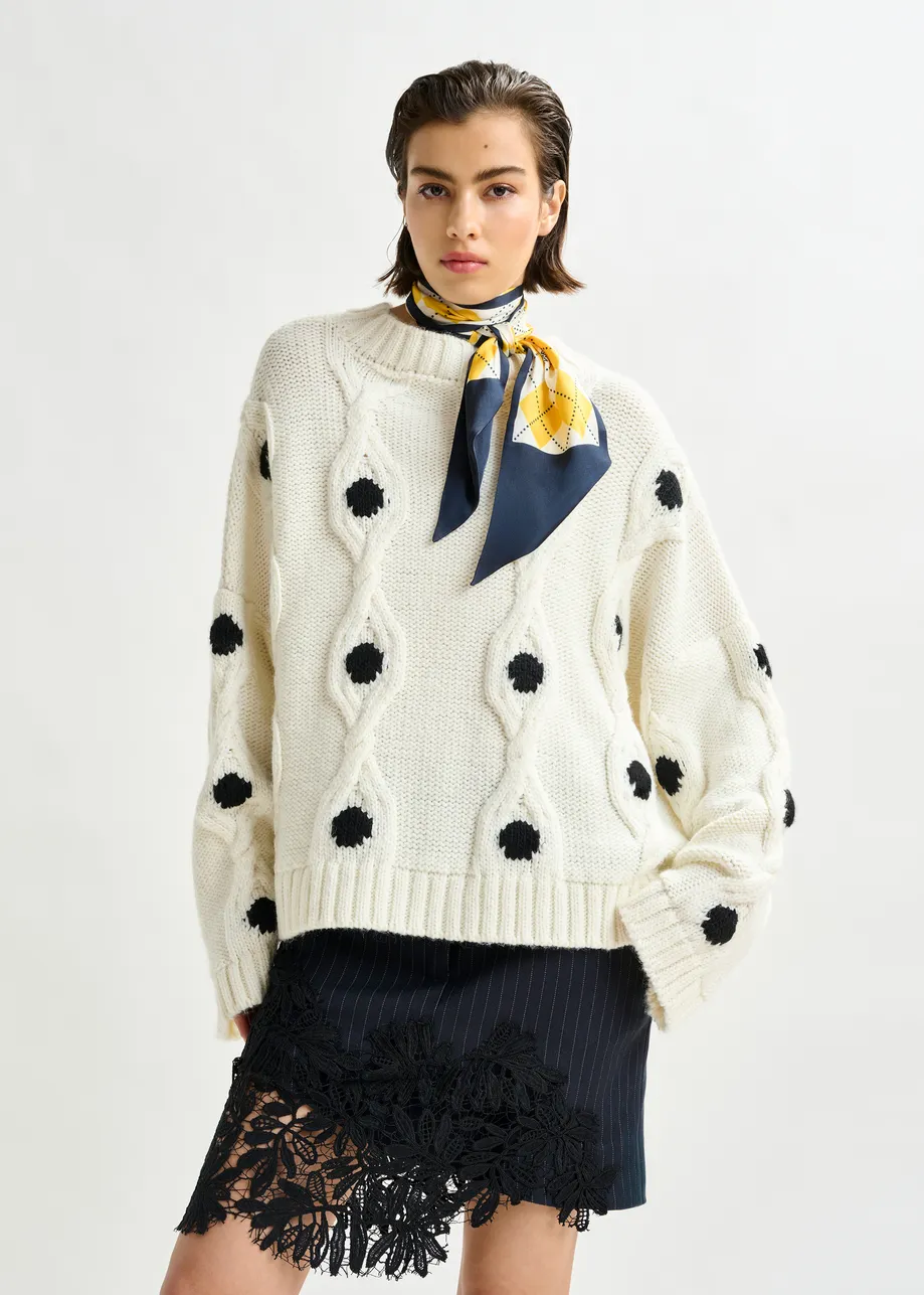 White and black polka-dot cable-knit sweater