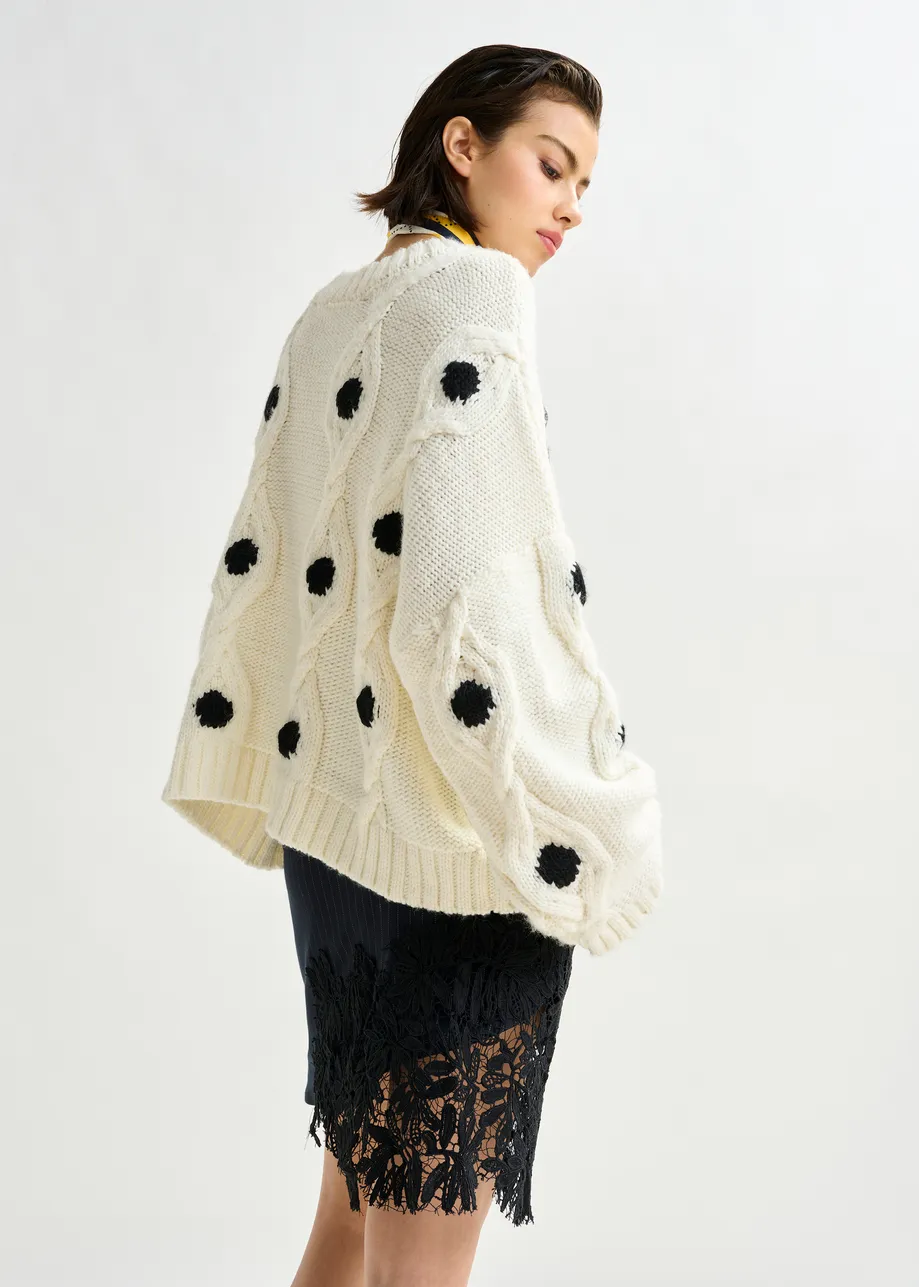 White and black polka-dot cable-knit sweater