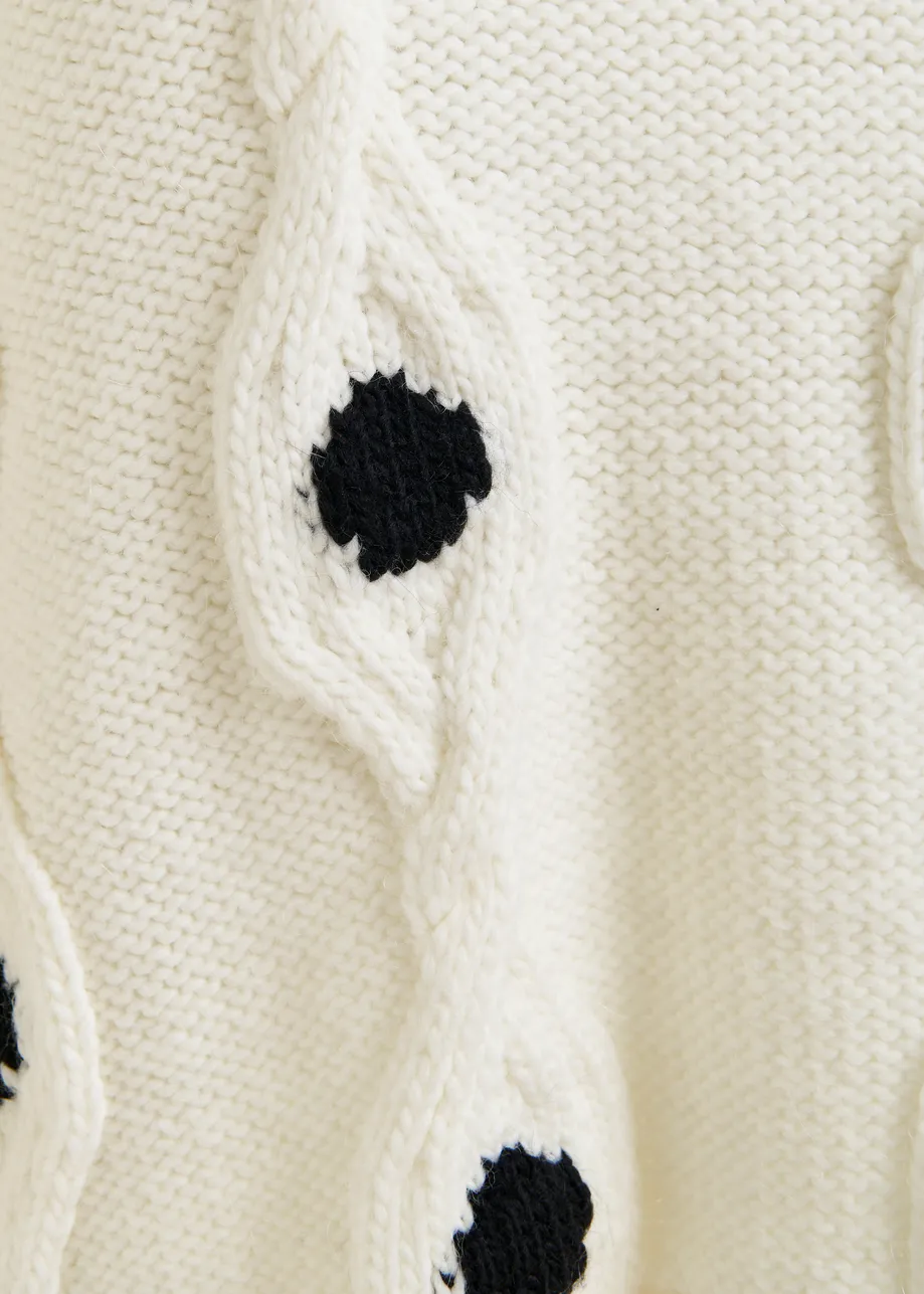 White and black polka-dot cable-knit sweater