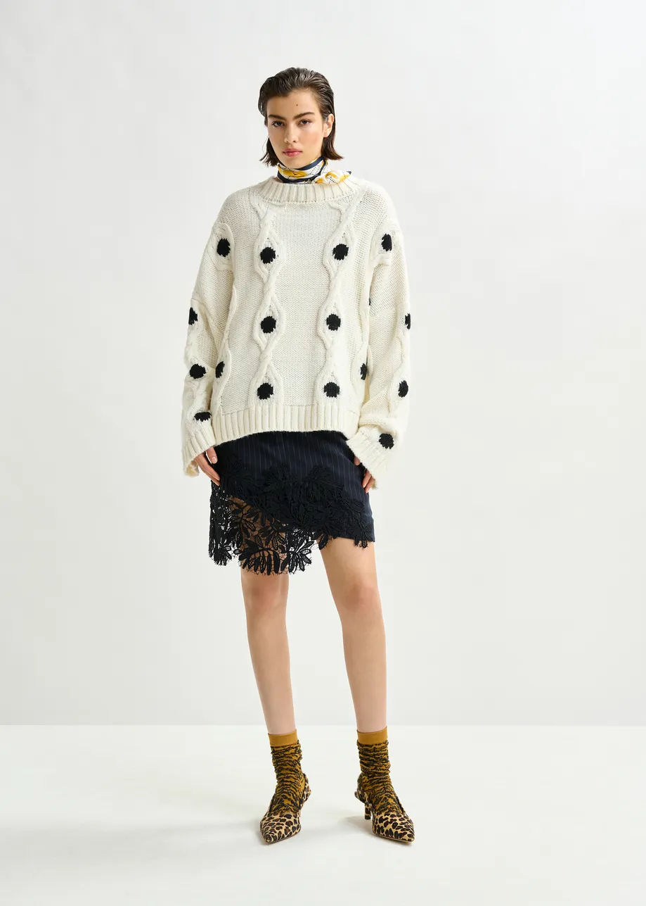 White and black polka-dot cable-knit sweater