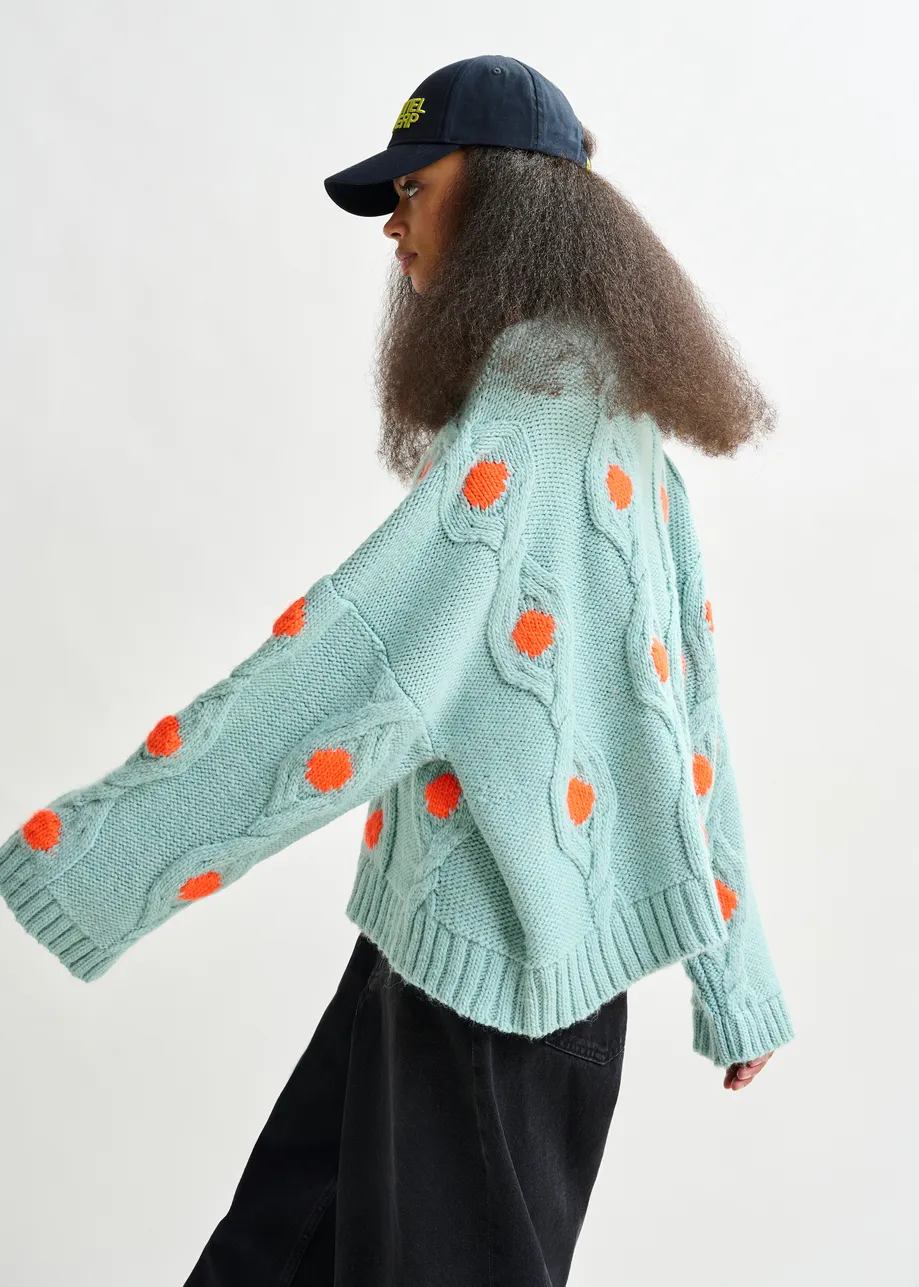 Light blue and orange polka-dot cable-knit sweater