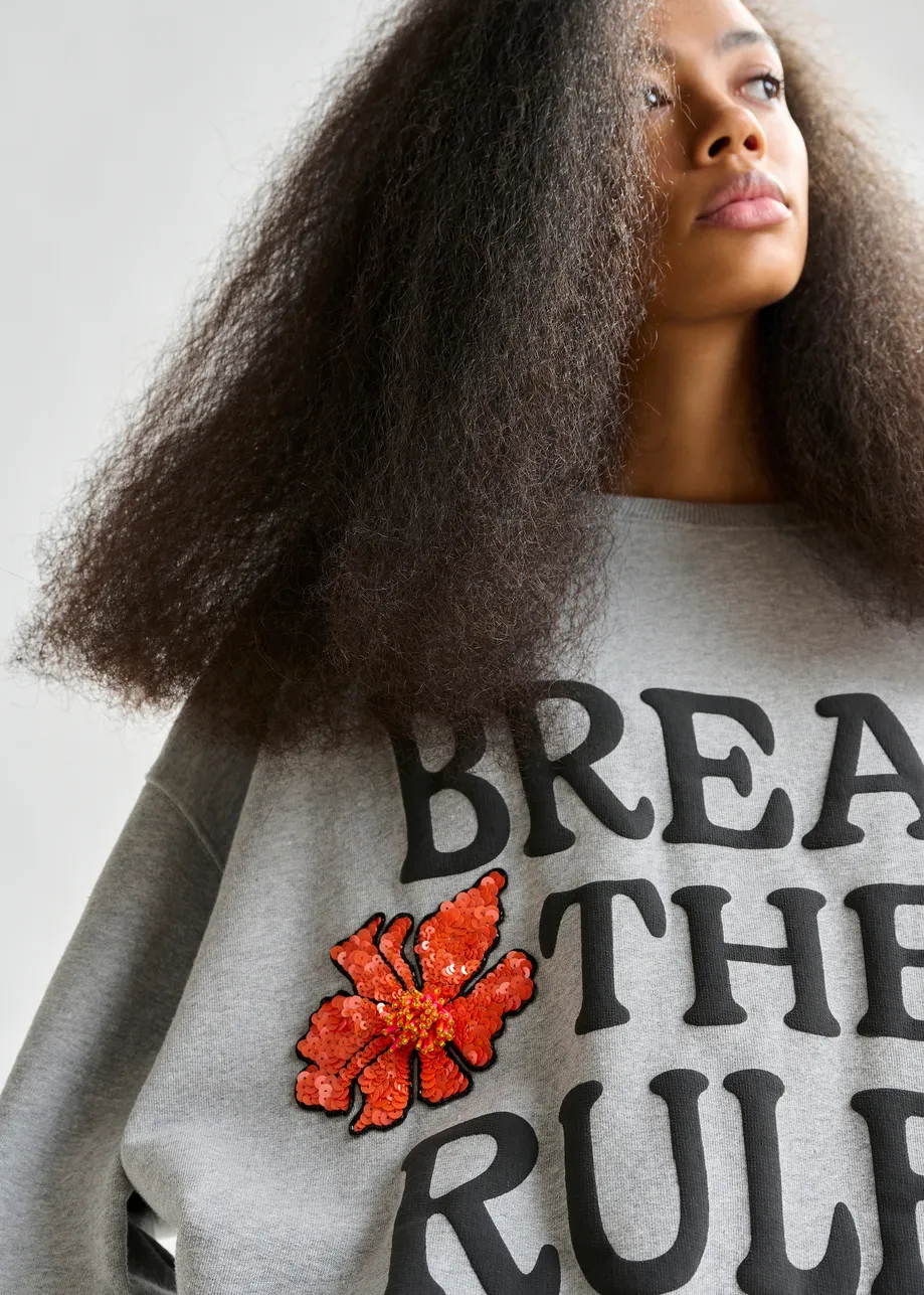 Grey, black and orange cotton sweatshirt with sequin and bead embellishments