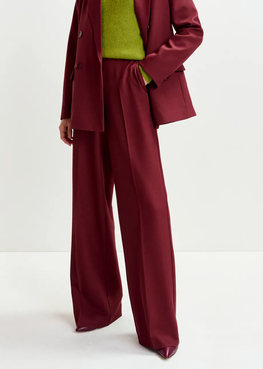 Burgundy wide-leg pants with pressed crease