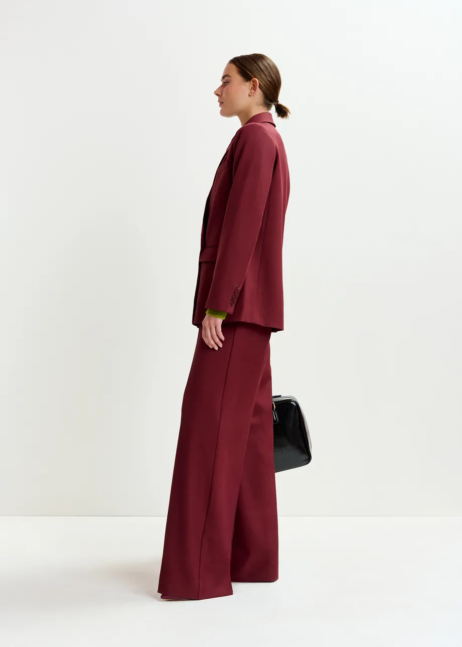 Burgundy wide-leg pants with pressed crease
