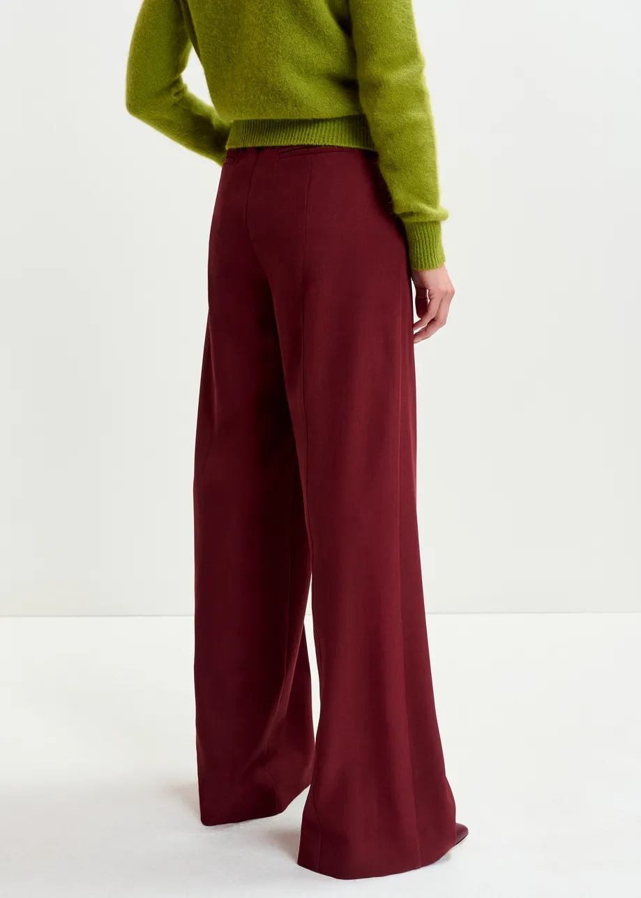 Burgundy wide-leg pants with pressed crease