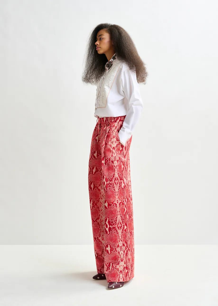 Red and orange snakeprint wide-leg pants