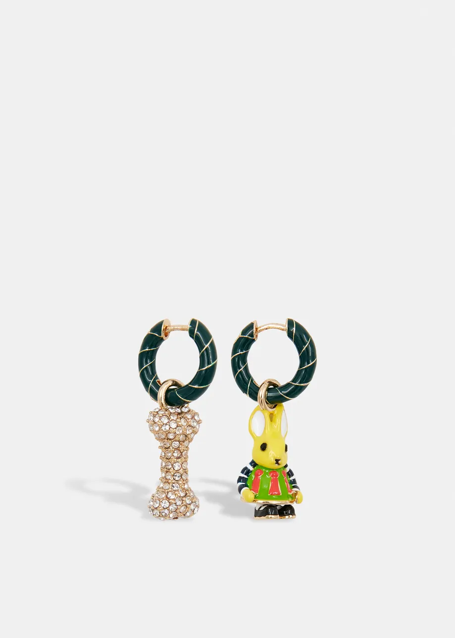 Dark green and gold hoop earrings with bunny and bone pendants