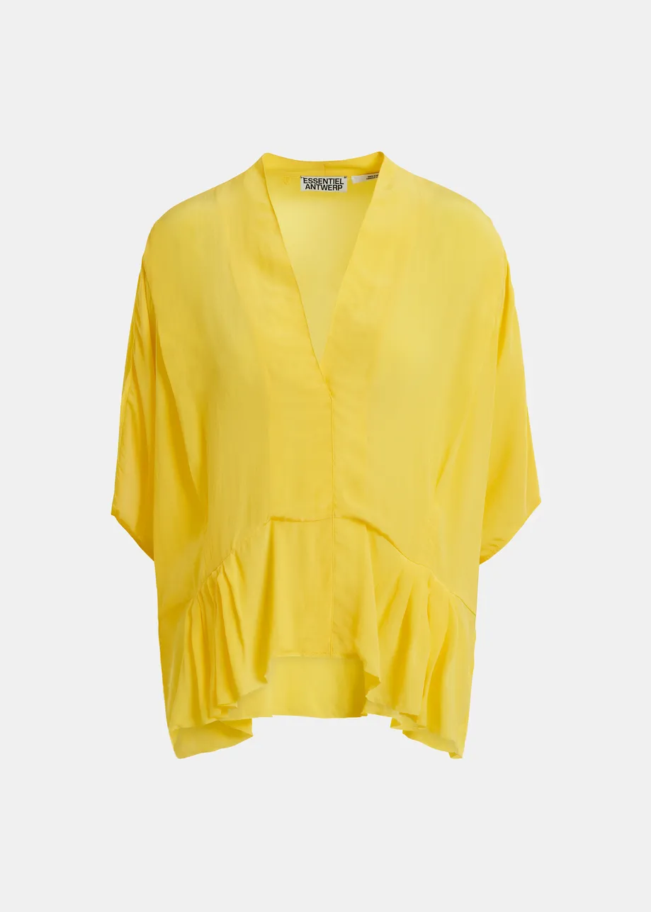 Gele oversized top met peplumzoom