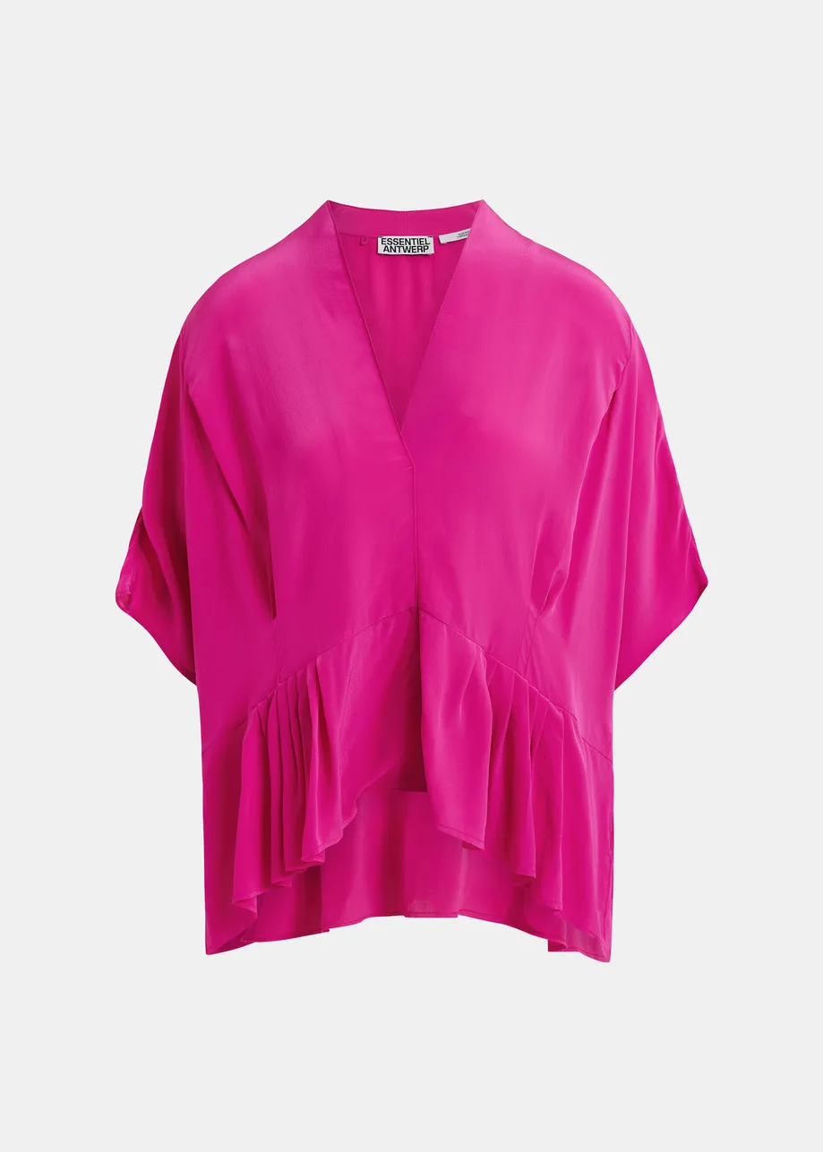 Roze oversized top met peplumzoom