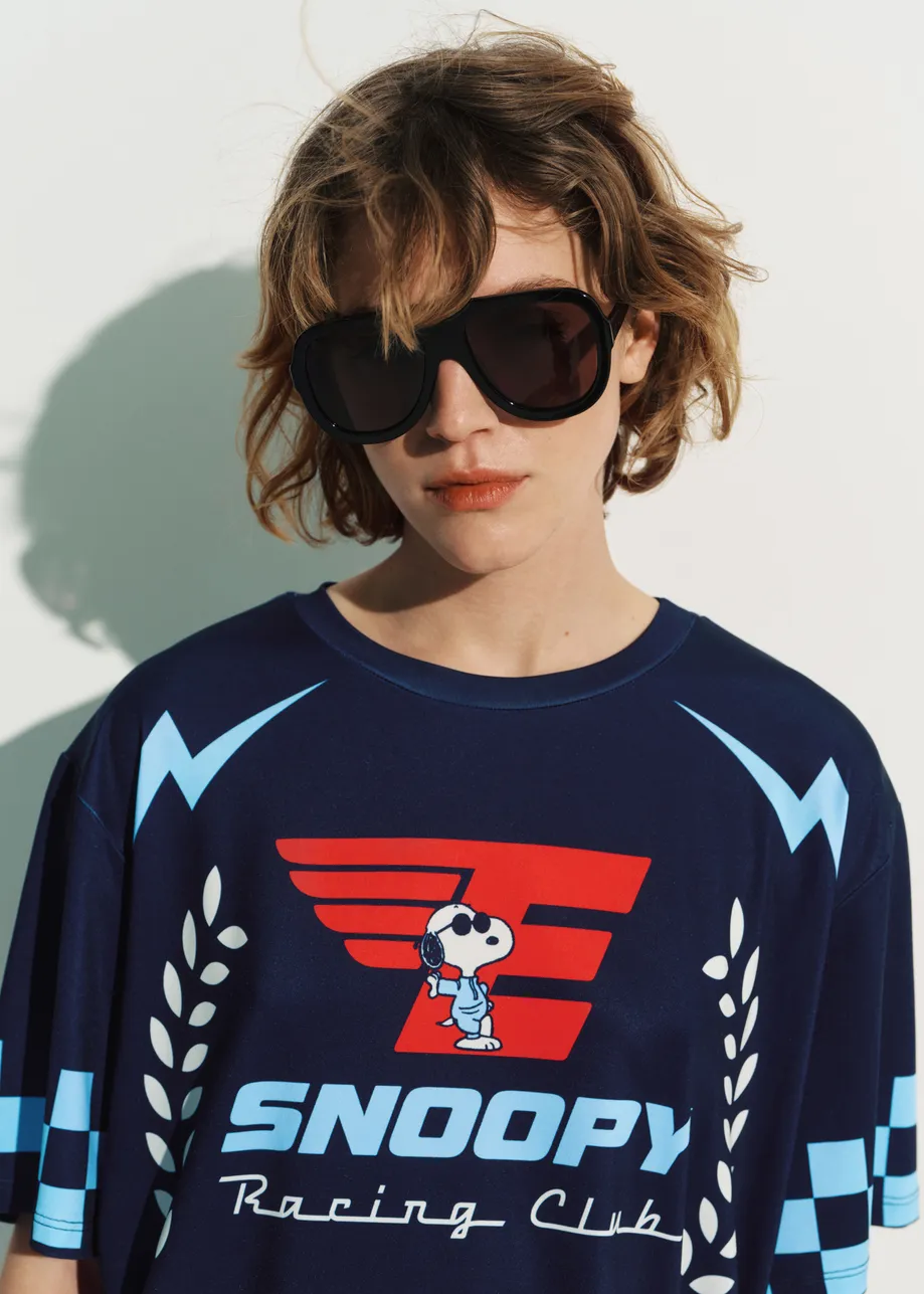 Navy graphic jersey mini dress with red and light blue Peanuts™ print