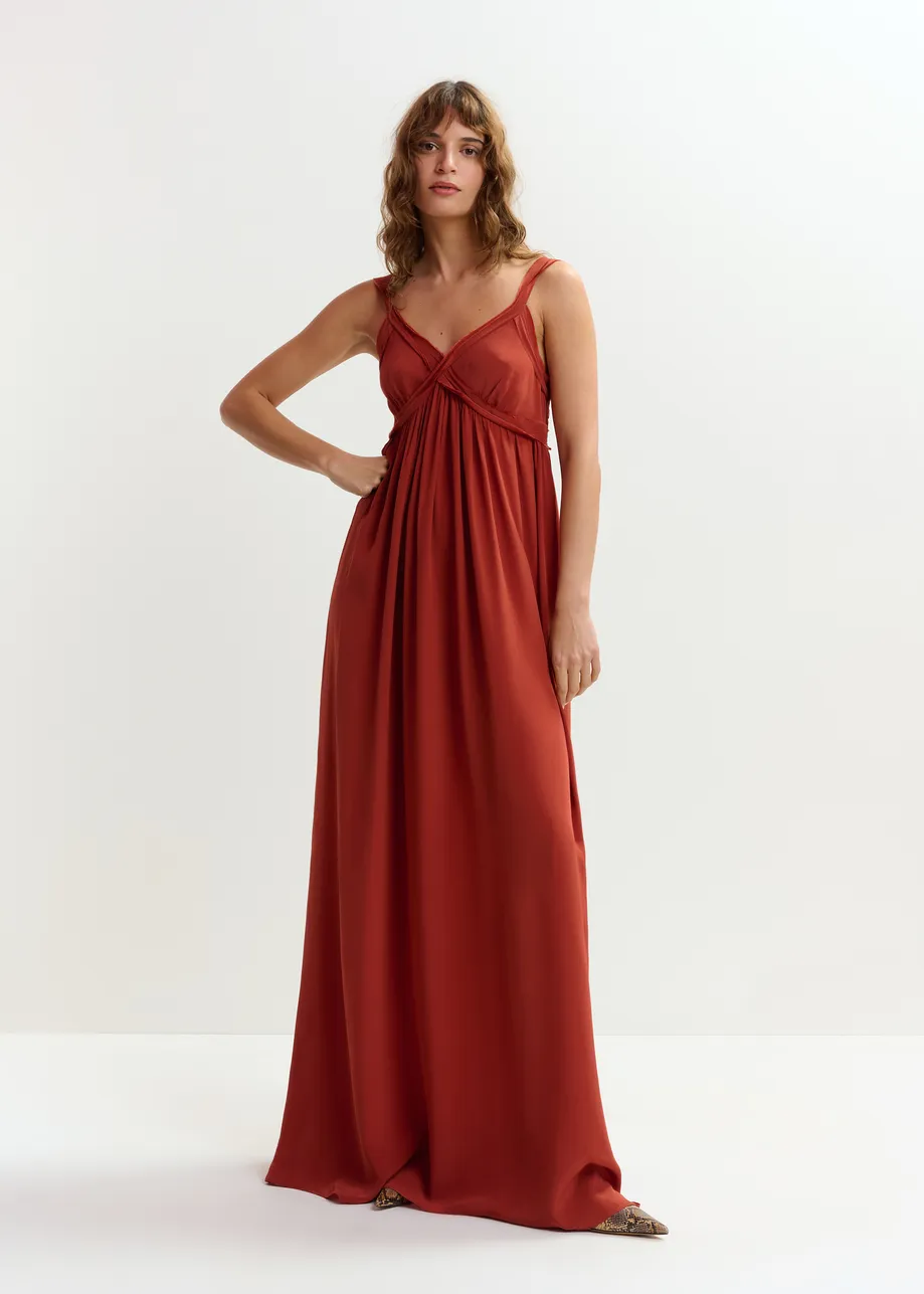 Burned orange babydoll maxi dress with empire waistline