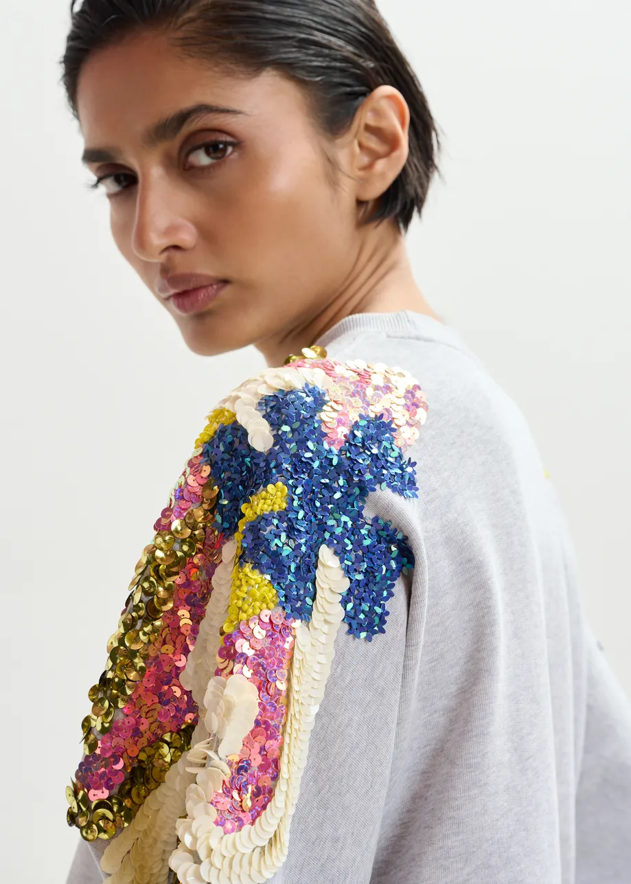 Felpa in cotone grigio con decorazioni multicolor di paillettes e perline