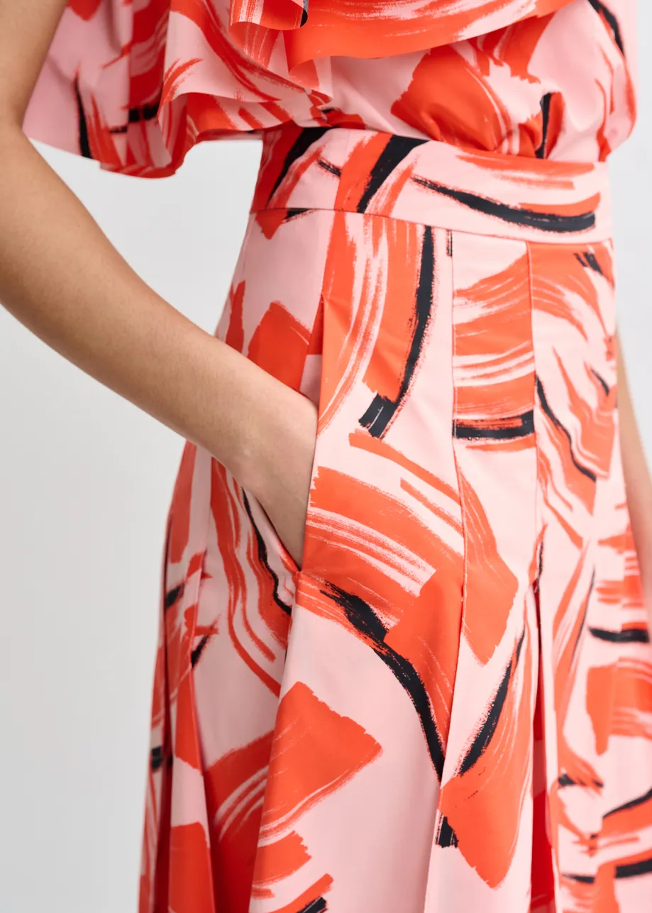 Light pink, orange and black a-line midi skirt