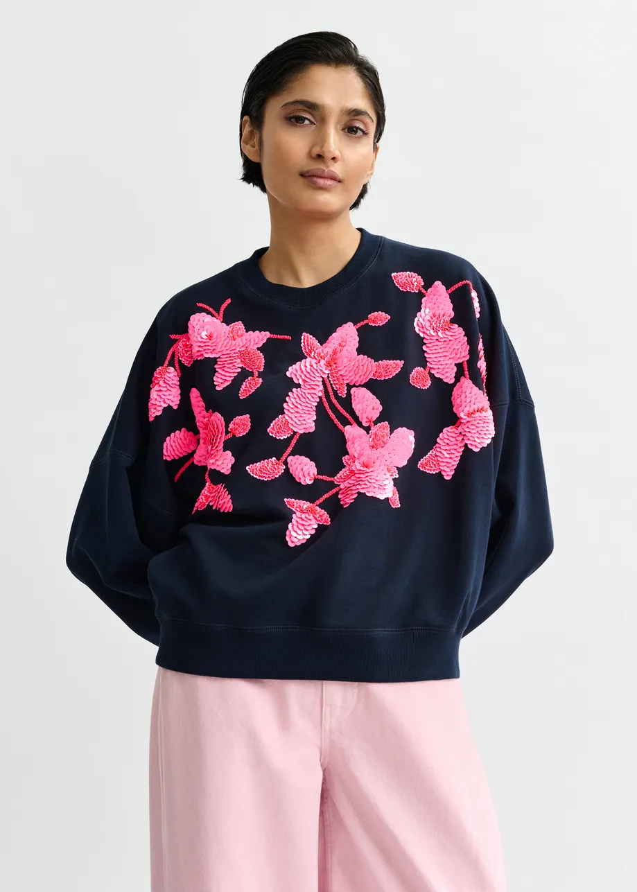 Marineblauwe katoenen sweater met roze bloemborduurwerk