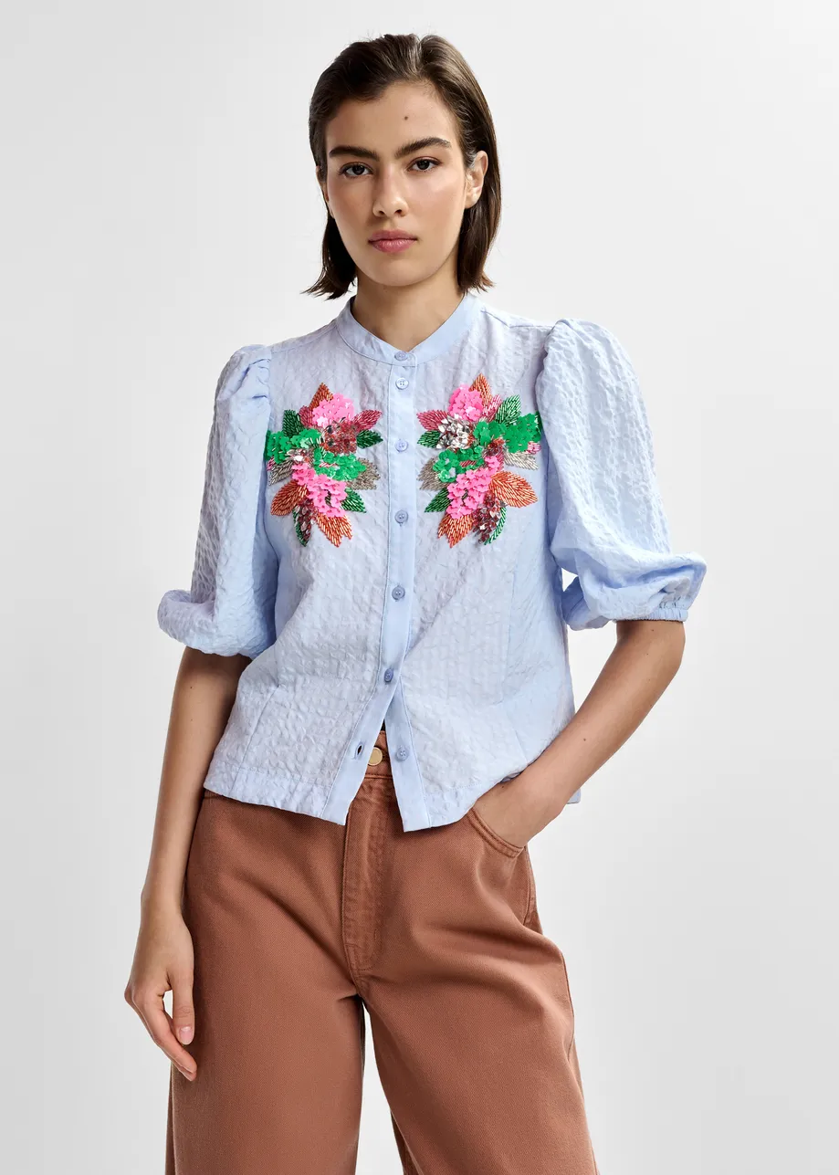 Light blue and multicolor floral sequin and bead-embellished shirt with voluminous sleeves