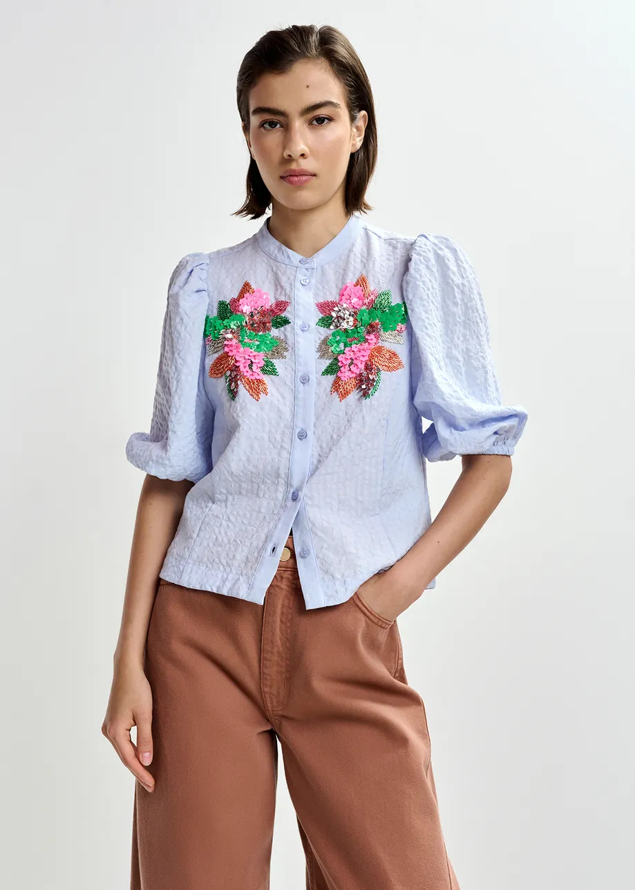 Light blue and multicolor floral sequin and bead-embellished shirt with voluminous sleeves