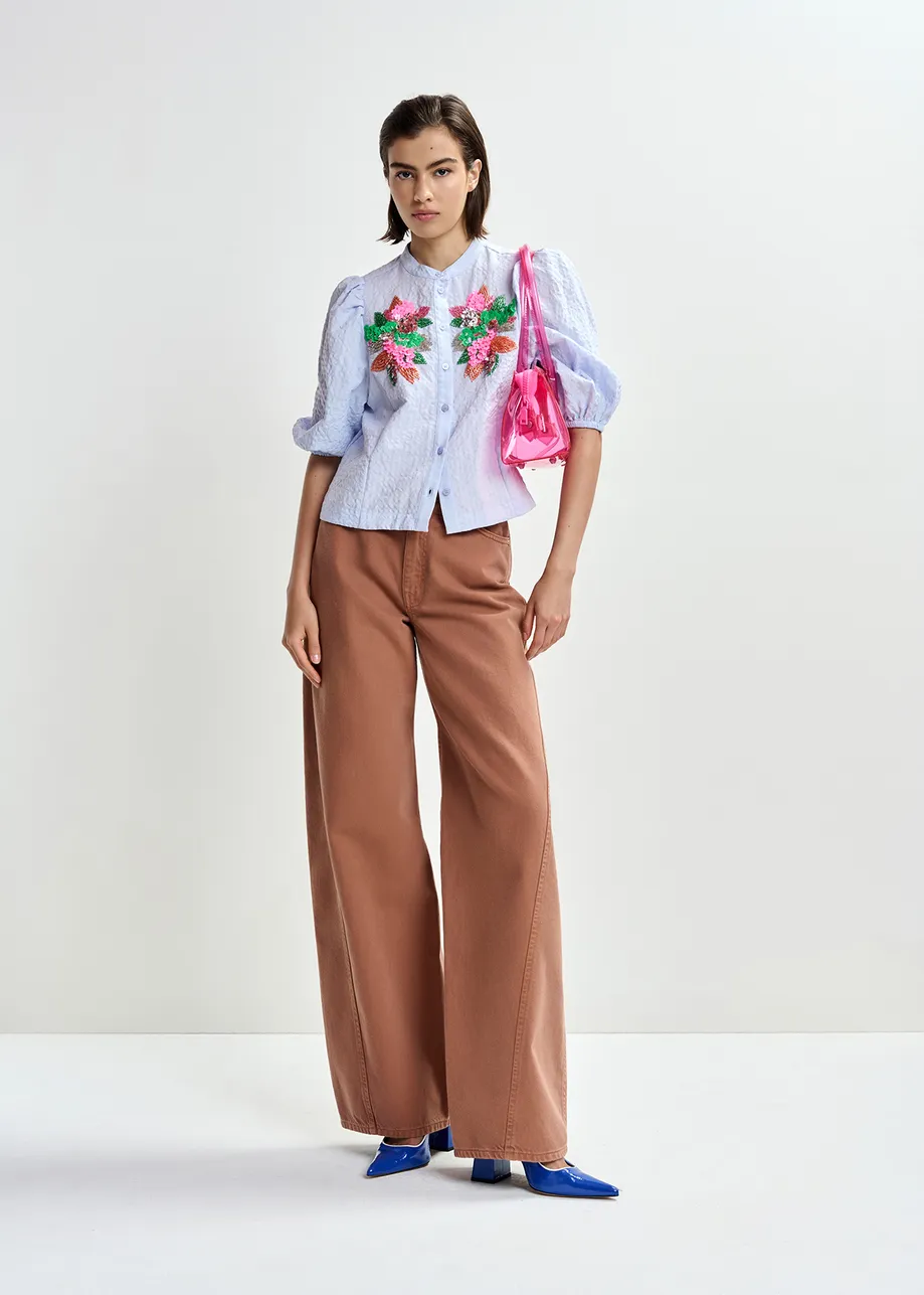 Light blue and multicolor floral sequin and bead-embellished shirt with voluminous sleeves