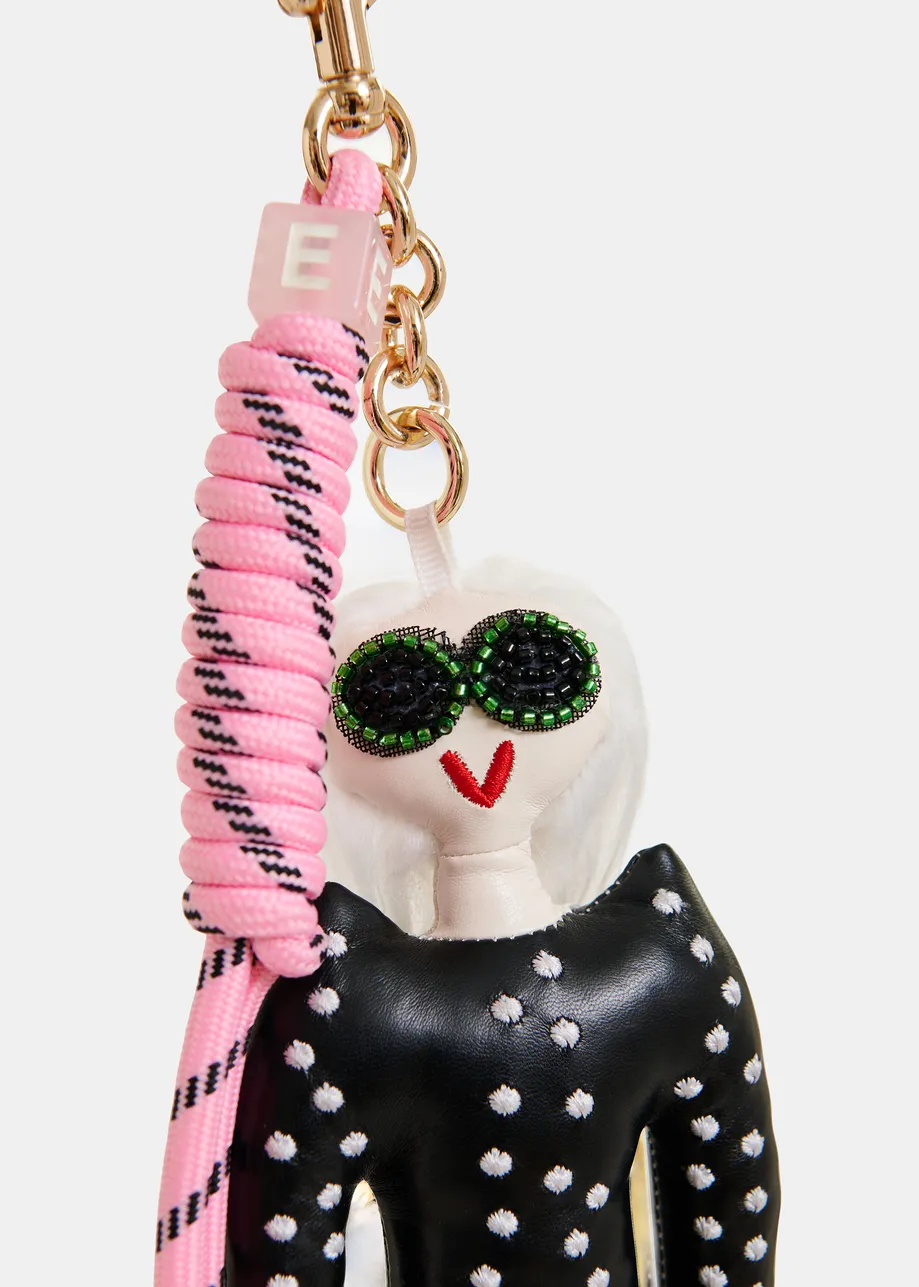 Black doll bag charm with pink twisted cord detail