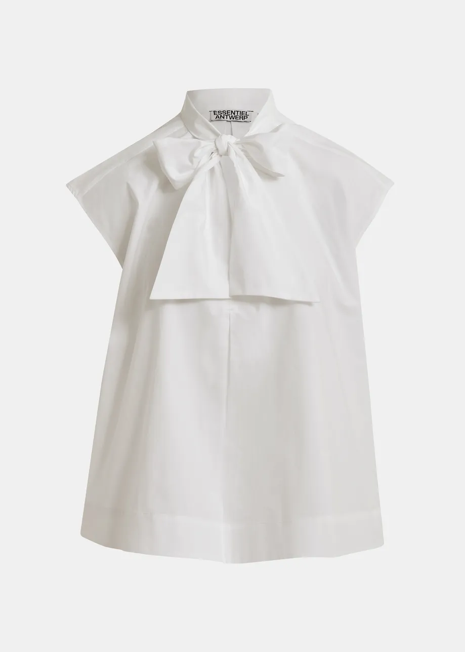 Off-white sleeveless top with tie neckline