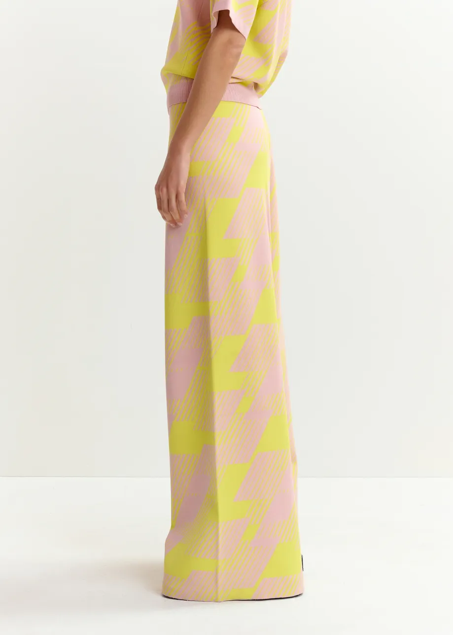 Ausgestellte Strickhose in Hellrosa mit gelbem Jacquardmuster