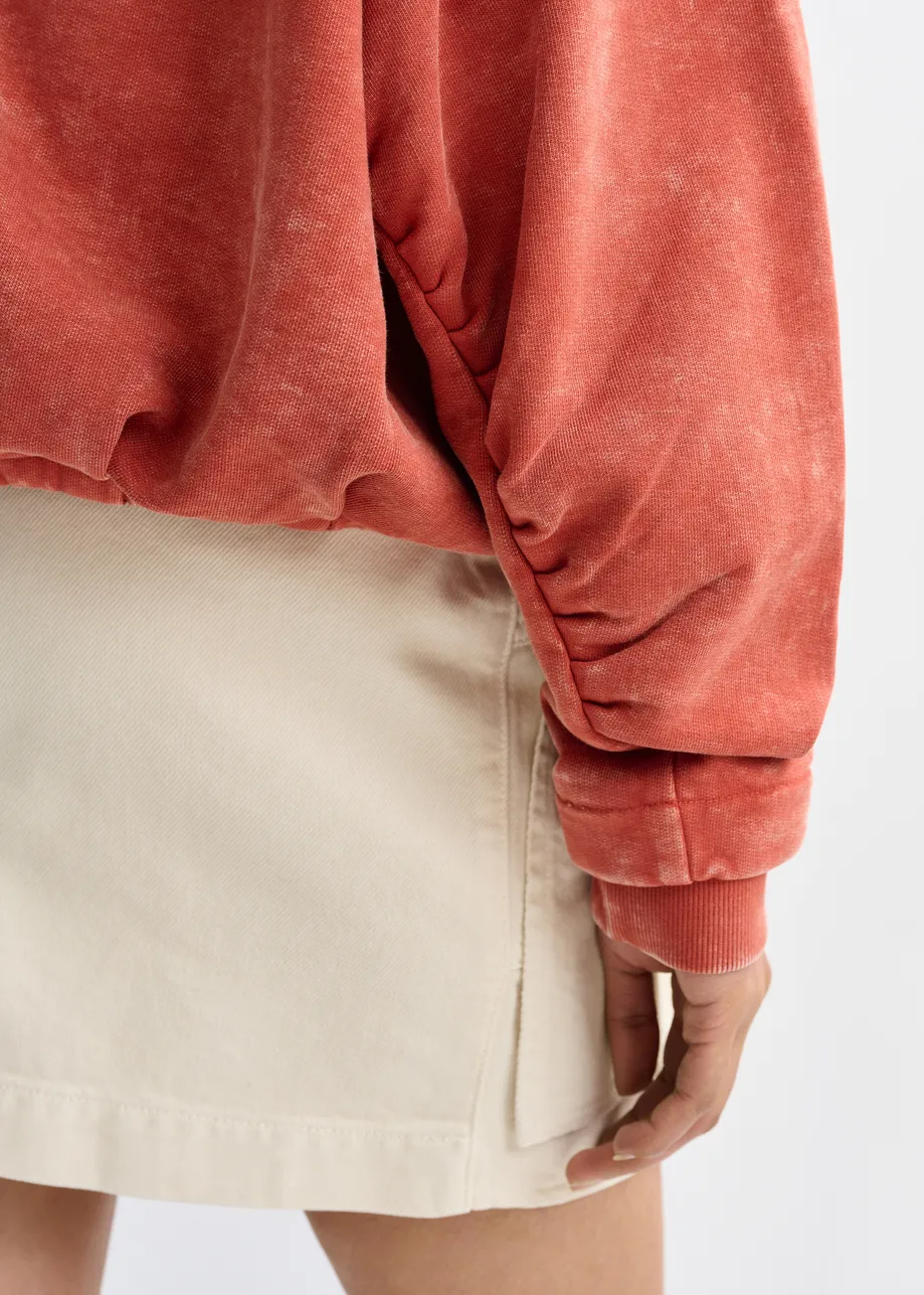 Gebrand oranje korte sweater met wikkeldetail