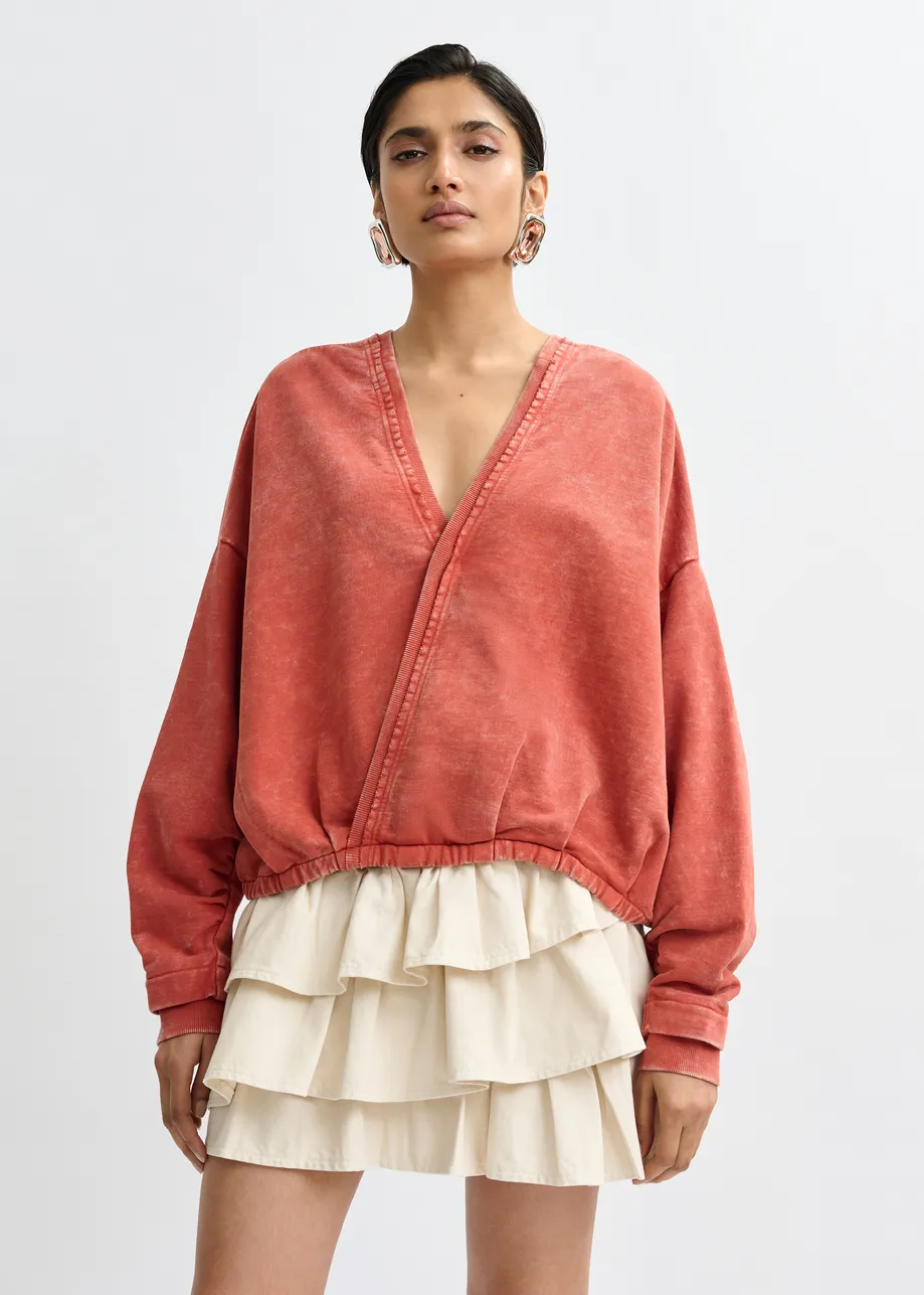 Gebrand oranje korte sweater met wikkeldetail